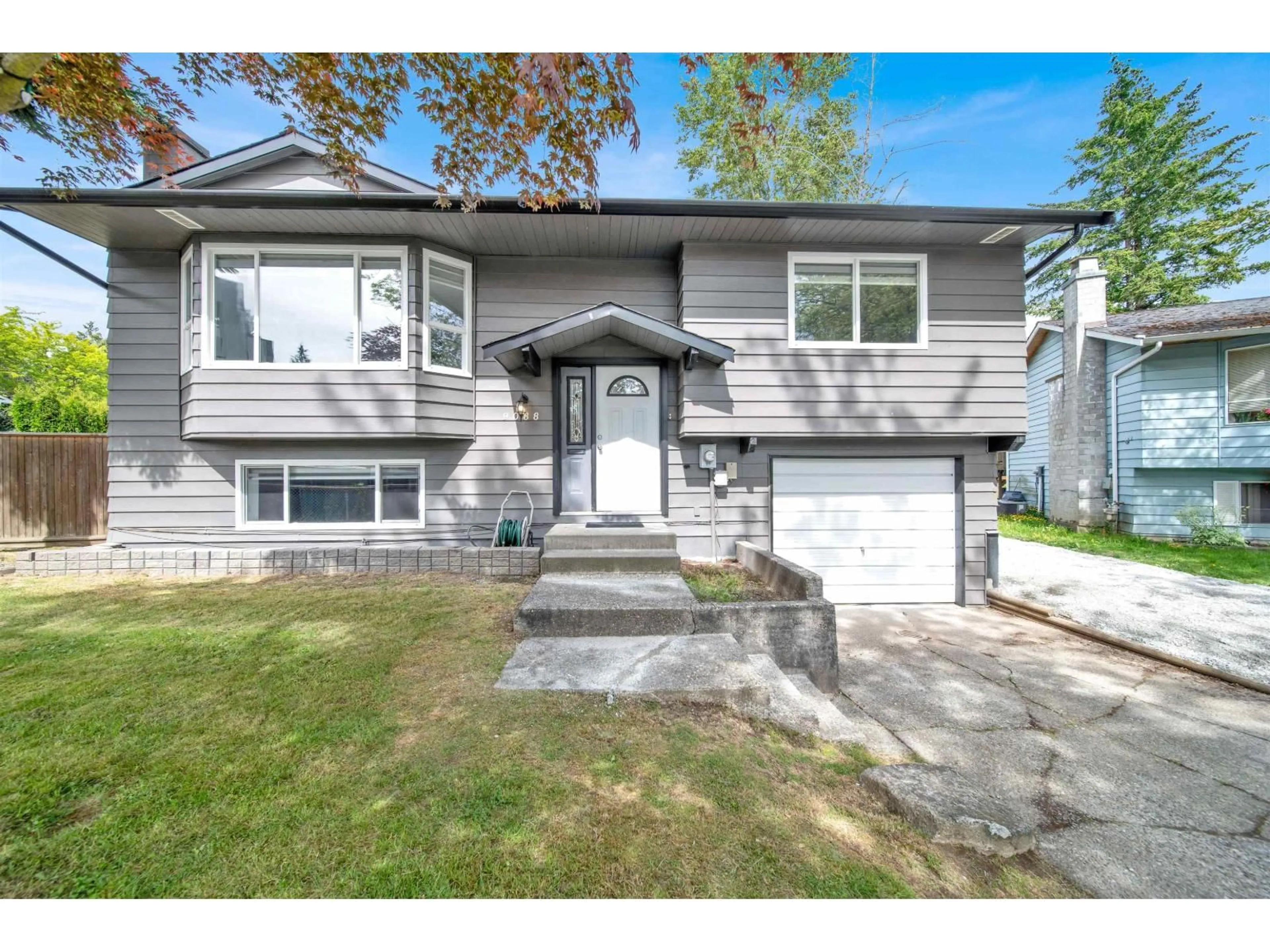 Home with vinyl exterior material, street for 9088 146A, Surrey British Columbia V3R6X7