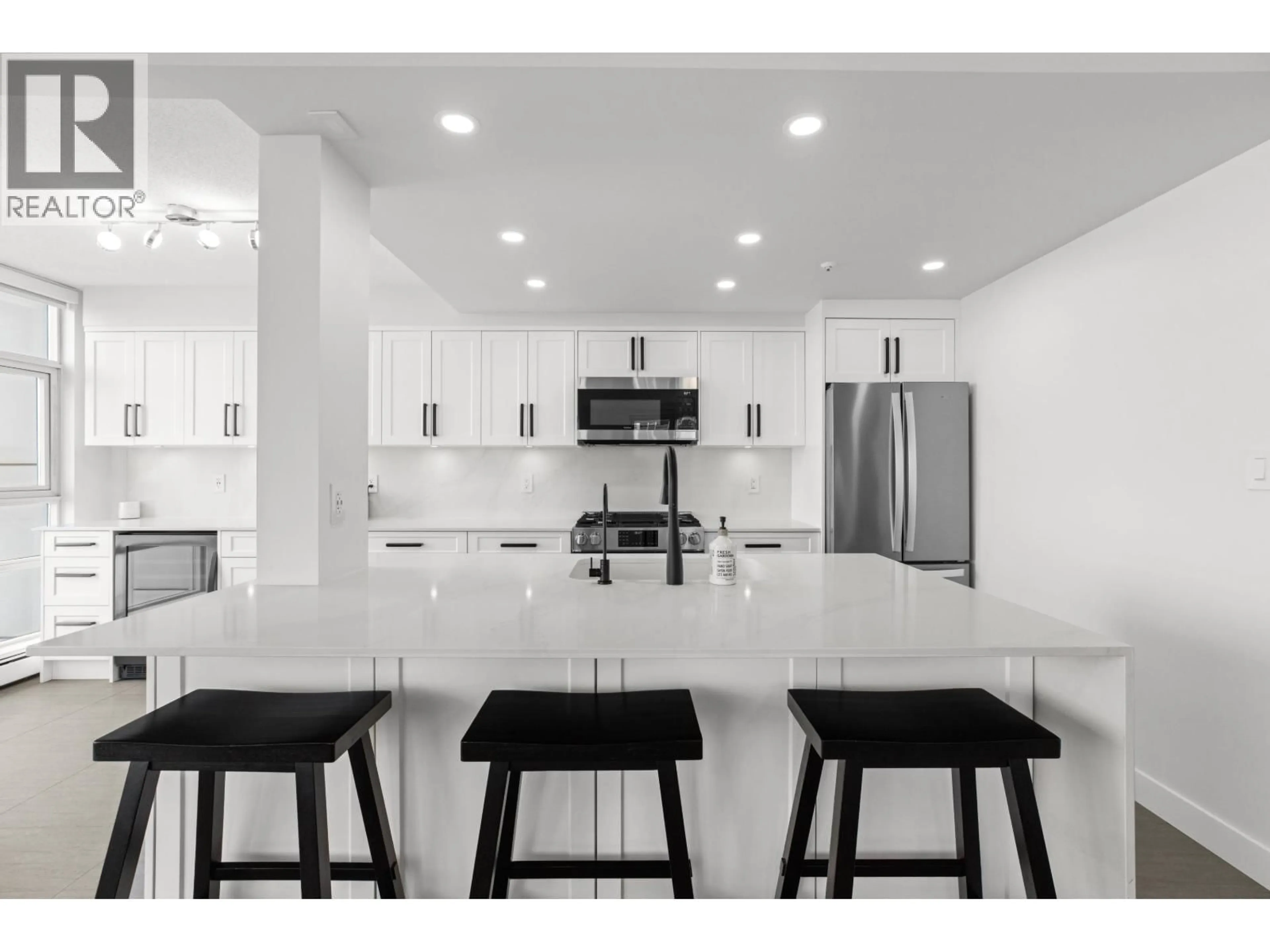 Open concept kitchen, ceramic/tile floor for 2006 - 198 AQUARIUS MEWS, Vancouver British Columbia V6Z2Y4