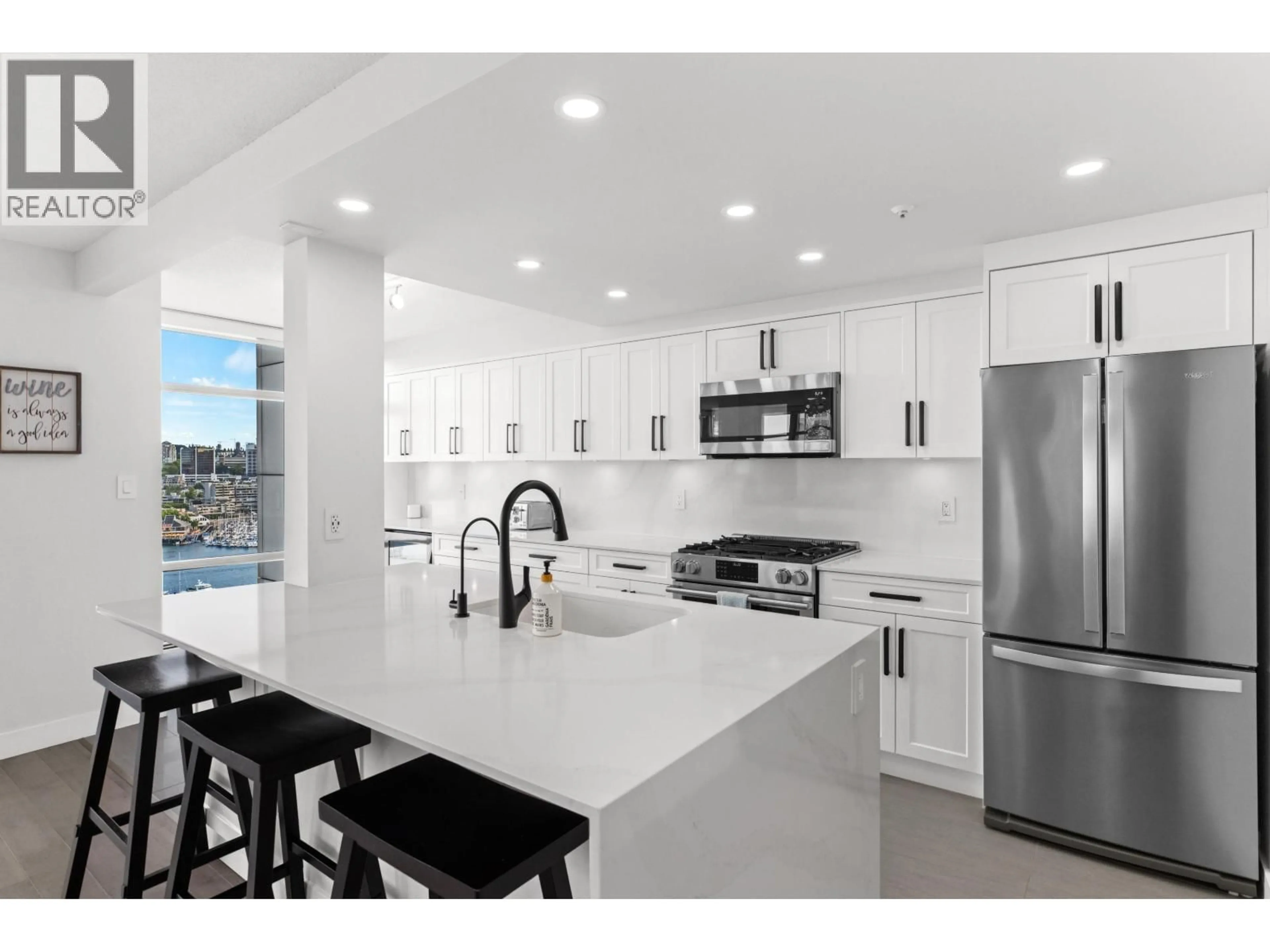 Open concept kitchen, ceramic/tile floor for 2006 - 198 AQUARIUS MEWS, Vancouver British Columbia V6Z2Y4