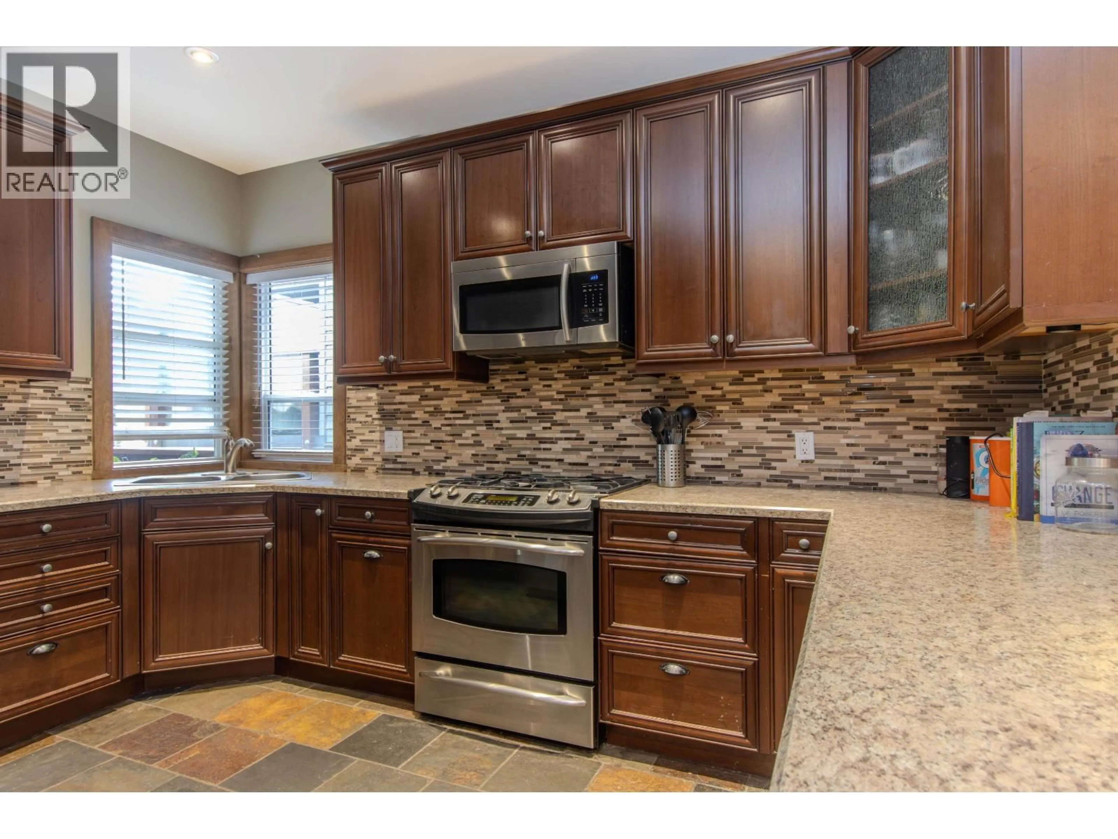 Open concept kitchen, ceramic/tile floor for 49 - 40137 GOVERNMENT ROAD, Squamish British Columbia V8B0N7