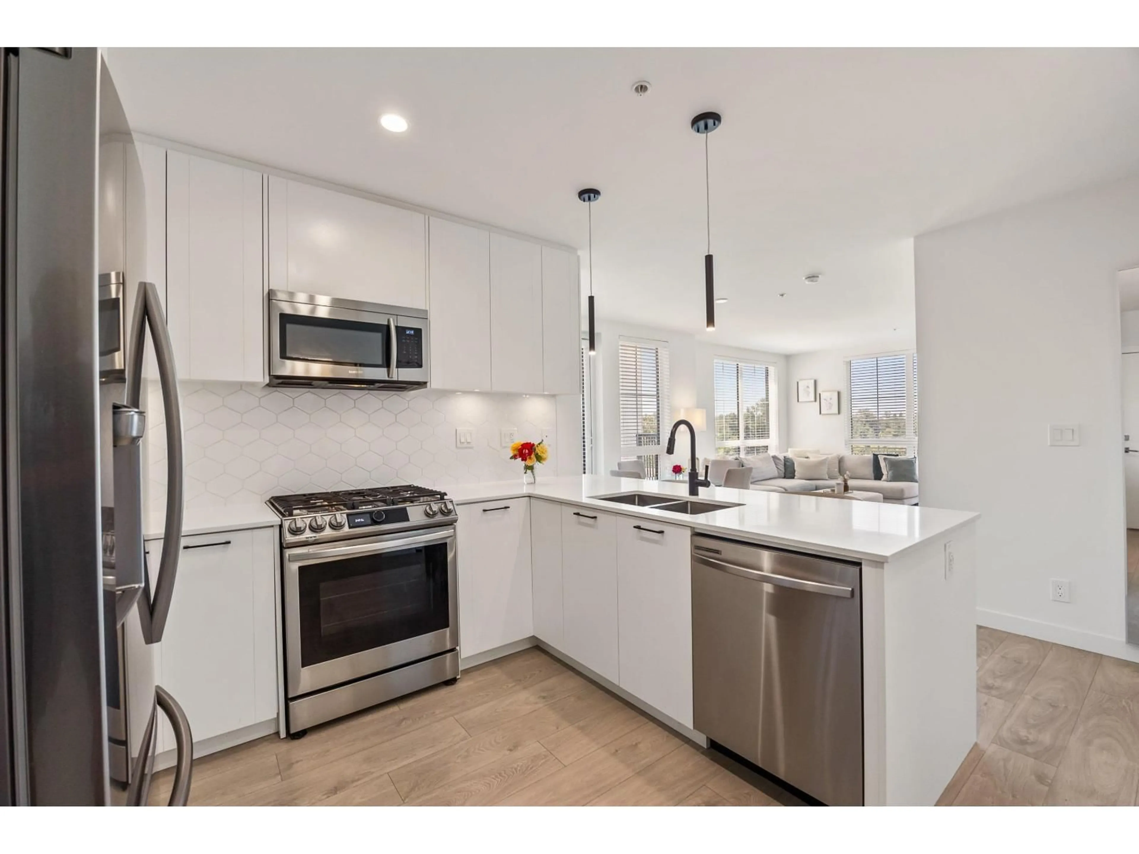 Open concept kitchen, ceramic/tile floor for A410 - 20018 83A, Langley British Columbia V2Y3P2