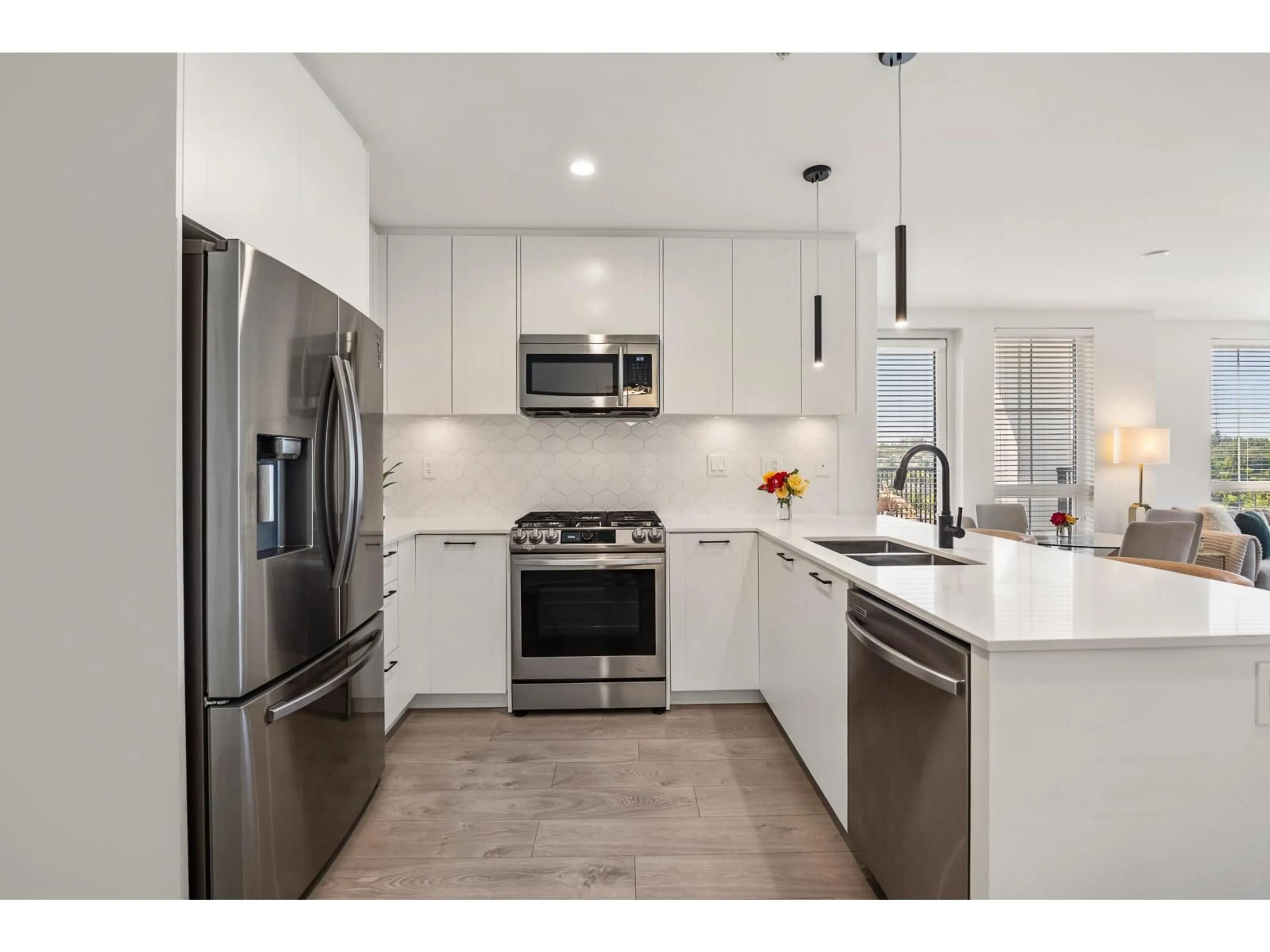 Open concept kitchen, ceramic/tile floor for A410 - 20018 83A, Langley British Columbia V2Y3P2
