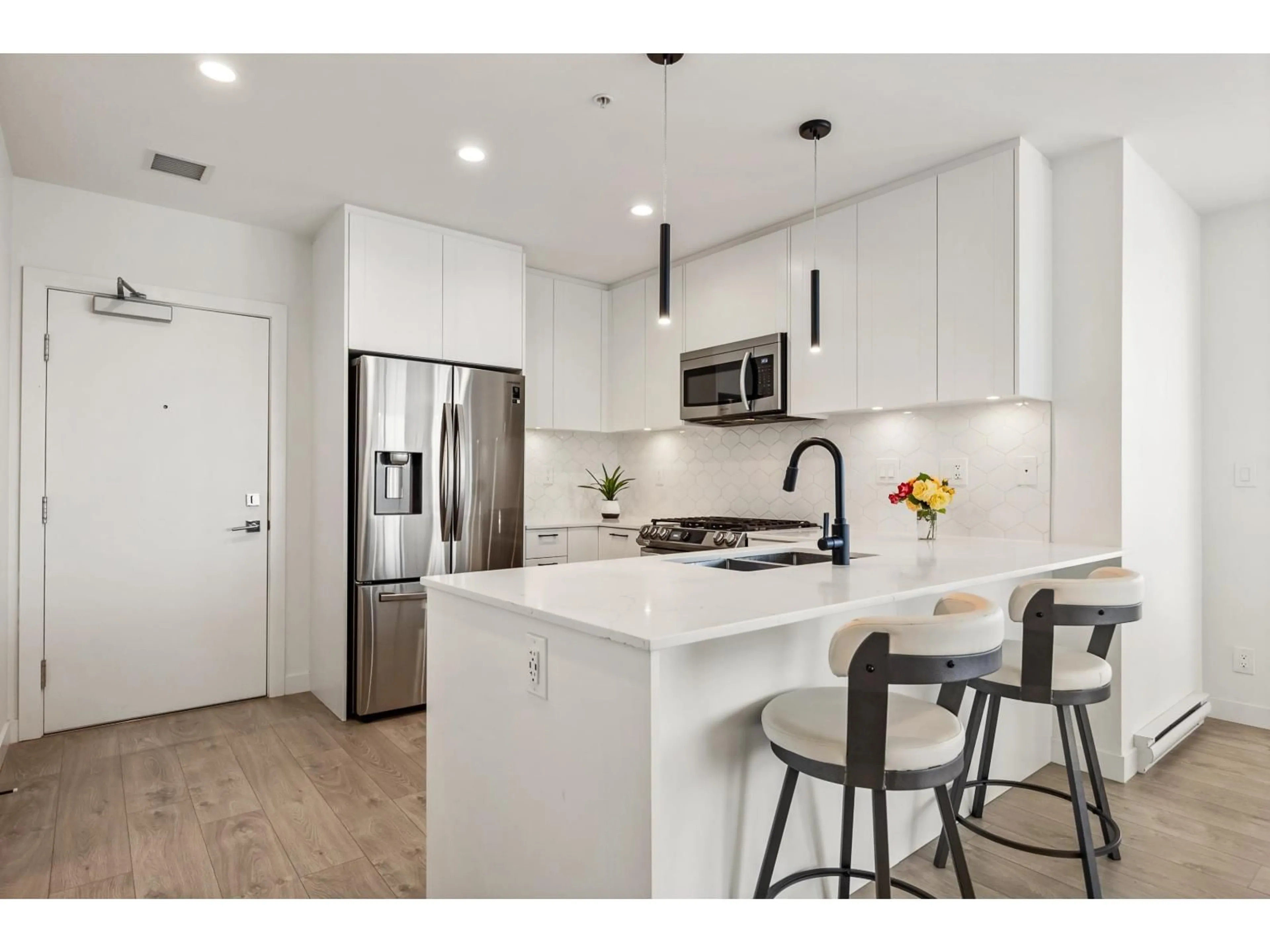 Open concept kitchen, unknown for A410 - 20018 83A, Langley British Columbia V2Y3P2