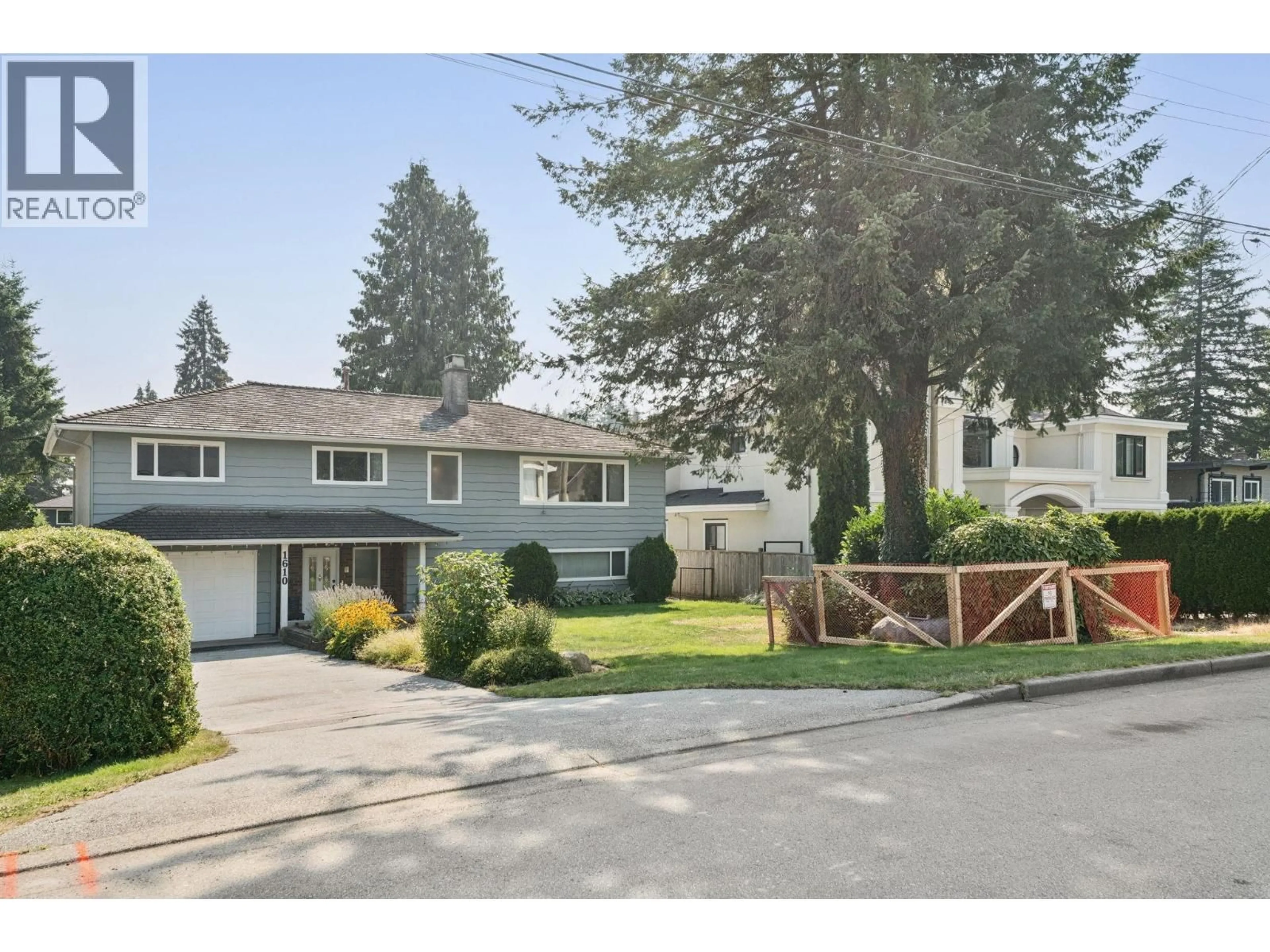 Home with vinyl exterior material, street for 1610 SMITH AVENUE, Coquitlam British Columbia V3J2Y3