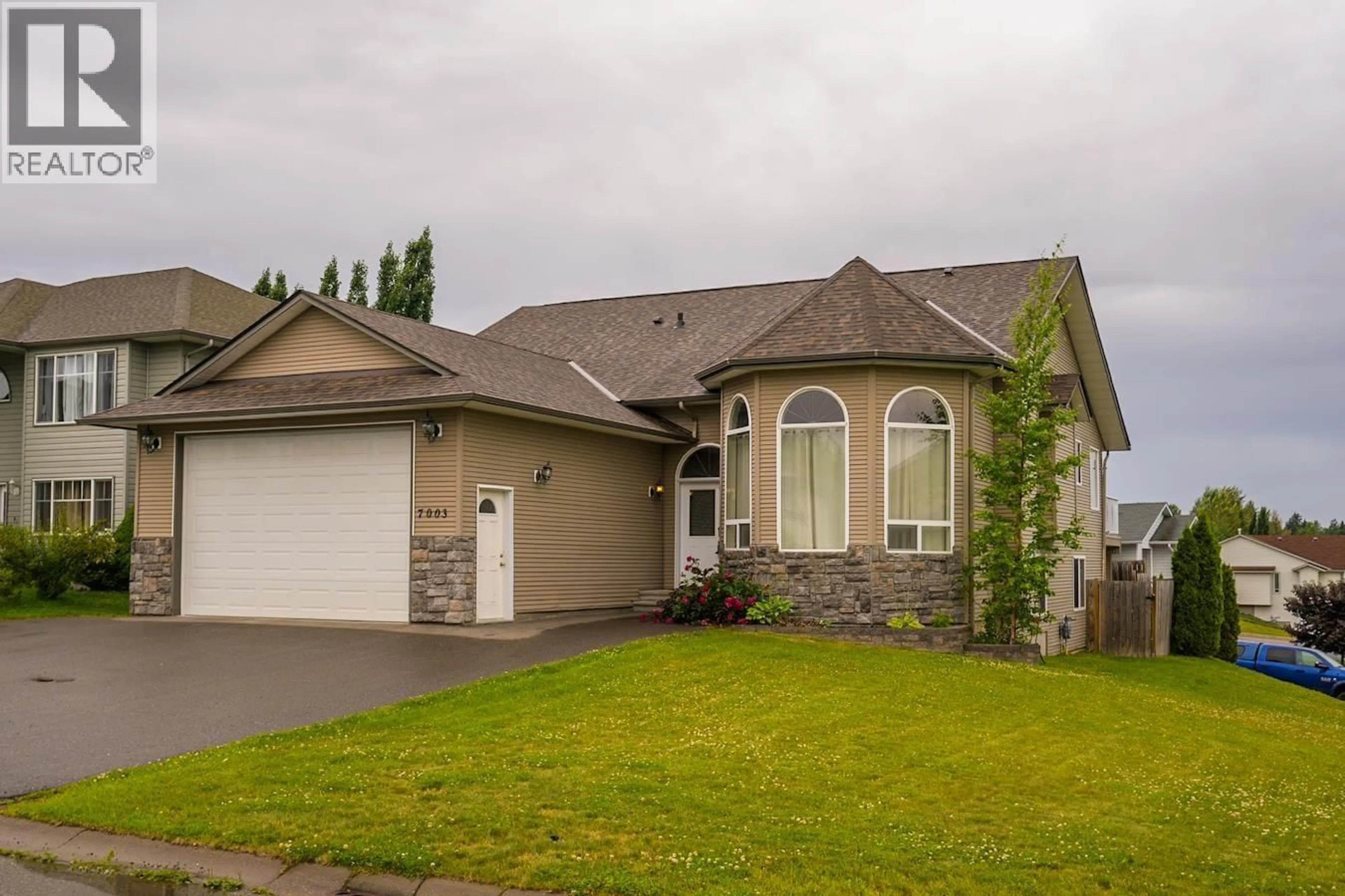 Home with vinyl exterior material, street for 7003 TRYGG COURT, Prince George British Columbia V2N6Z8