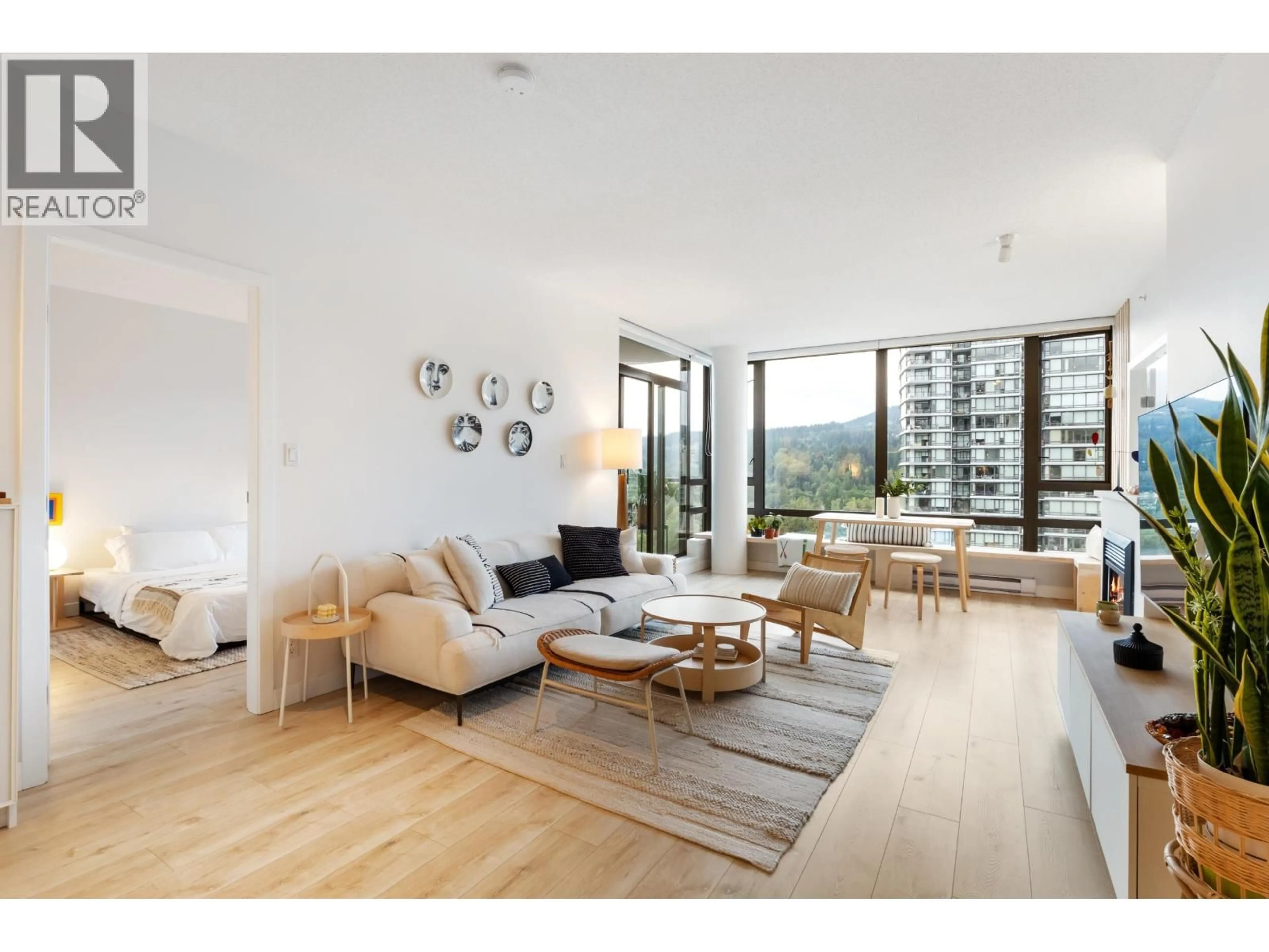 Living room with furniture, wood/laminate floor for 1607 - 400 CAPILANO ROAD, Port Moody British Columbia V3H0E1