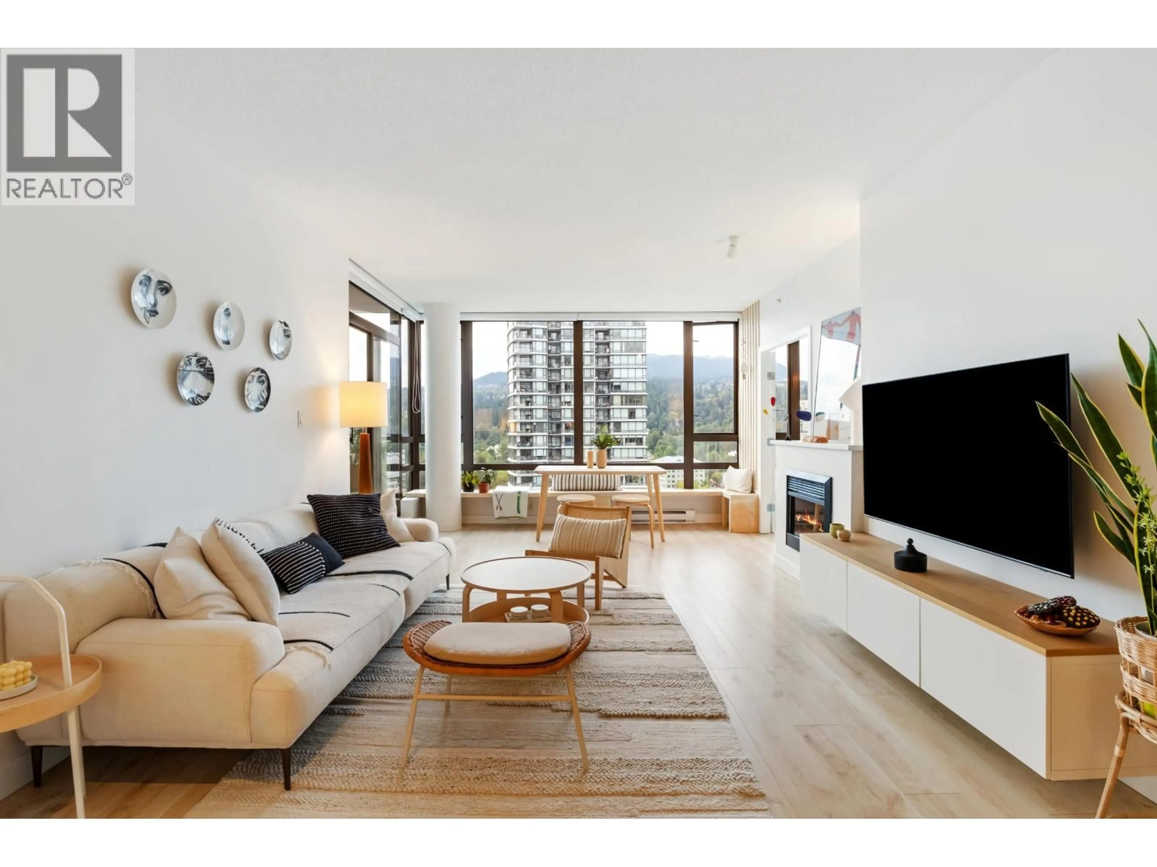 Living room with furniture, unknown for 1607 - 400 CAPILANO ROAD, Port Moody British Columbia V3H0E1