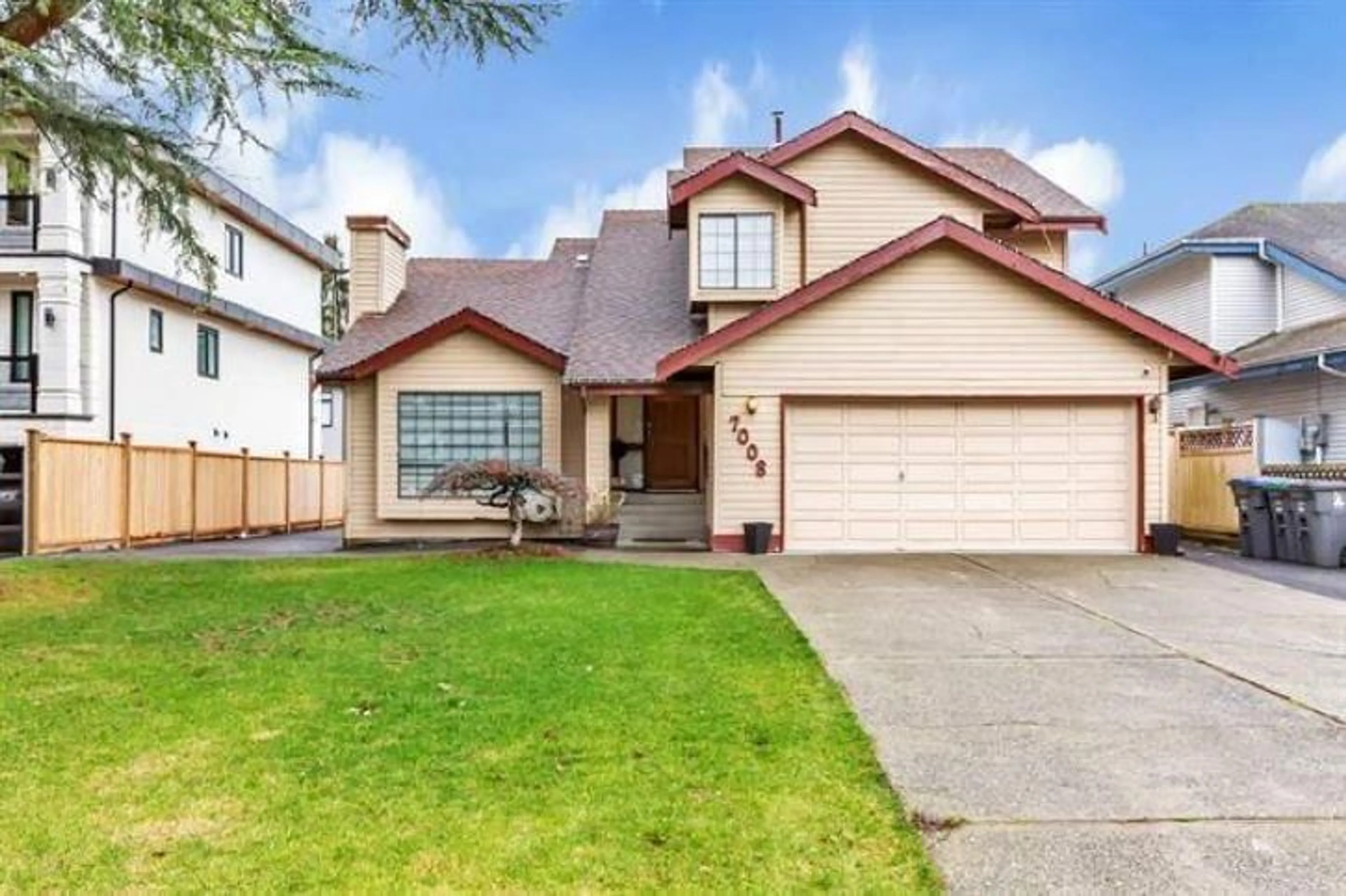 Home with vinyl exterior material, street for 7008 129A, Surrey British Columbia V3W7B2