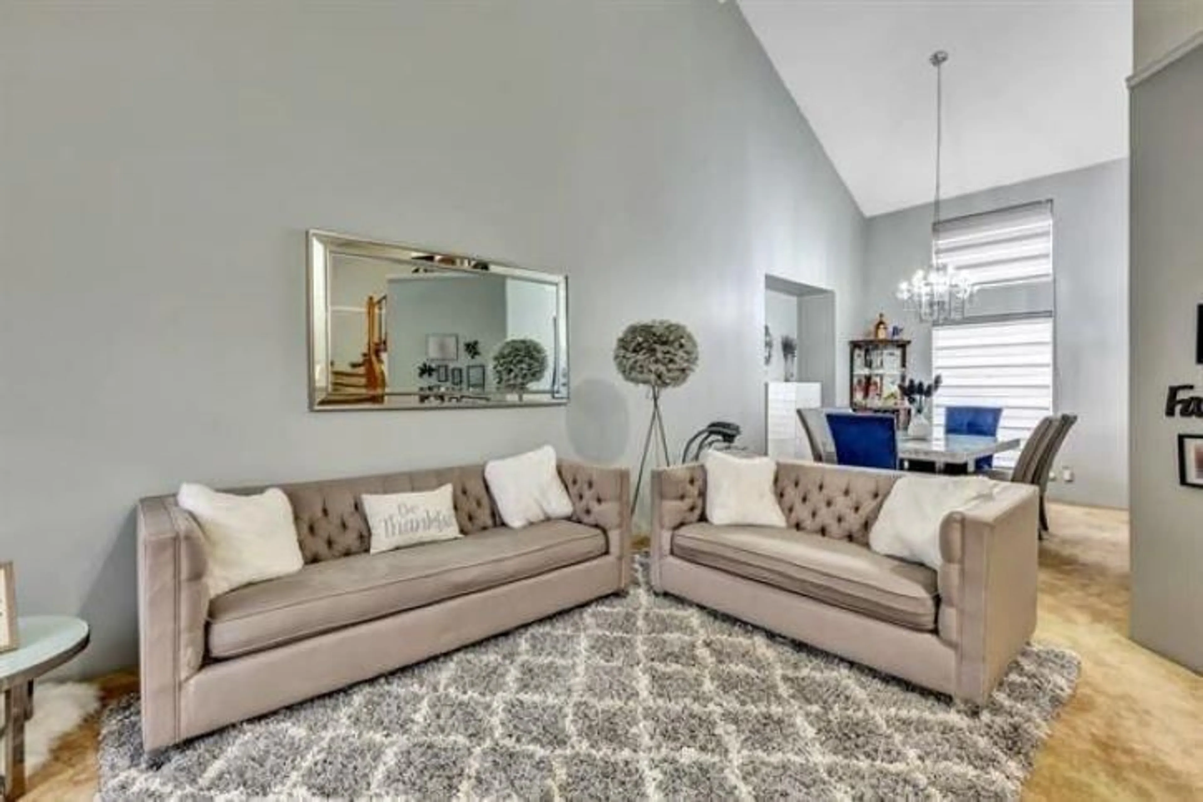 Living room with furniture, carpet floor for 7008 129A, Surrey British Columbia V3W7B2