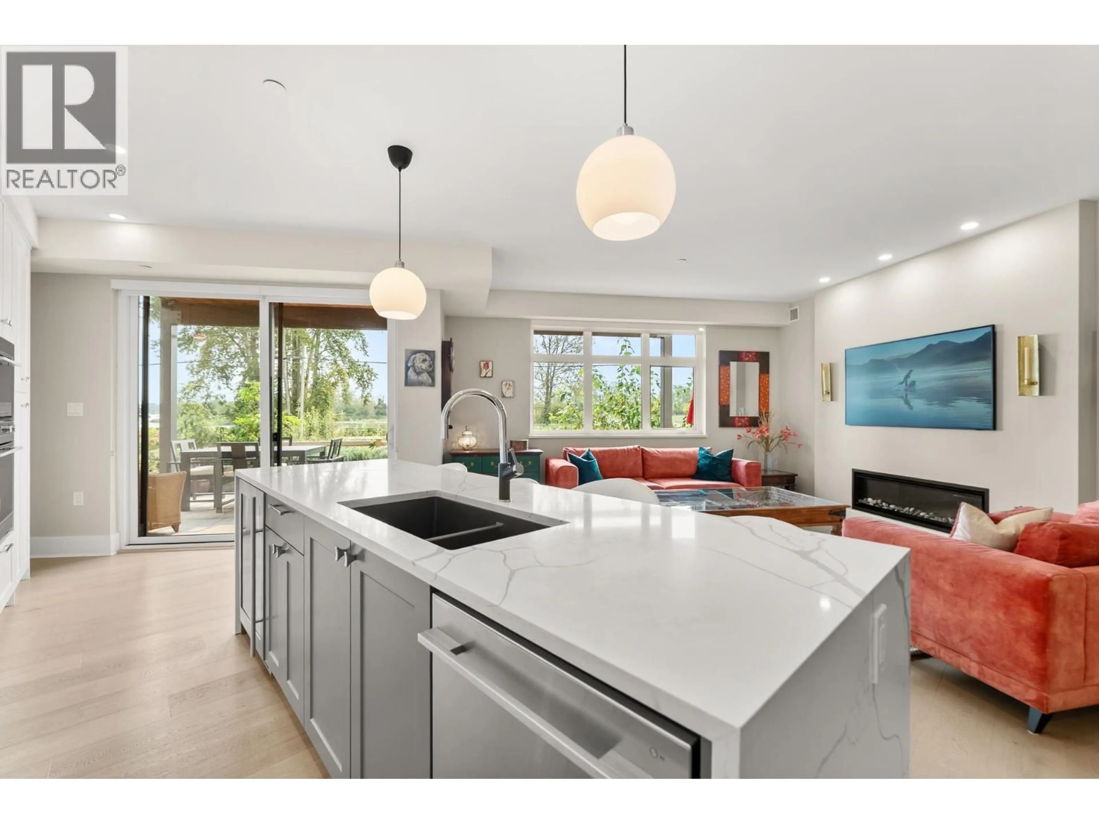 Open concept kitchen, ceramic/tile floor for 103 - 6111 DYKE ROAD, Richmond British Columbia V7E4J2