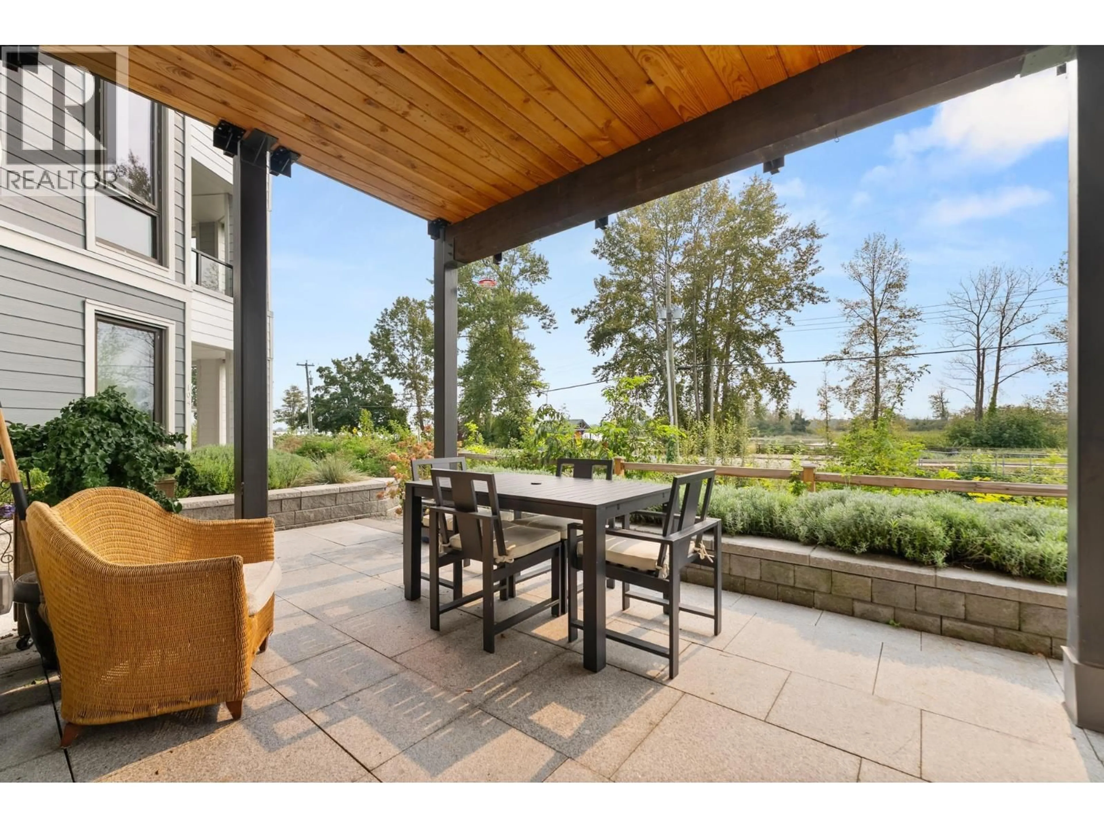 Patio, water/lake/river/ocean view for 103 - 6111 DYKE ROAD, Richmond British Columbia V7E4J2