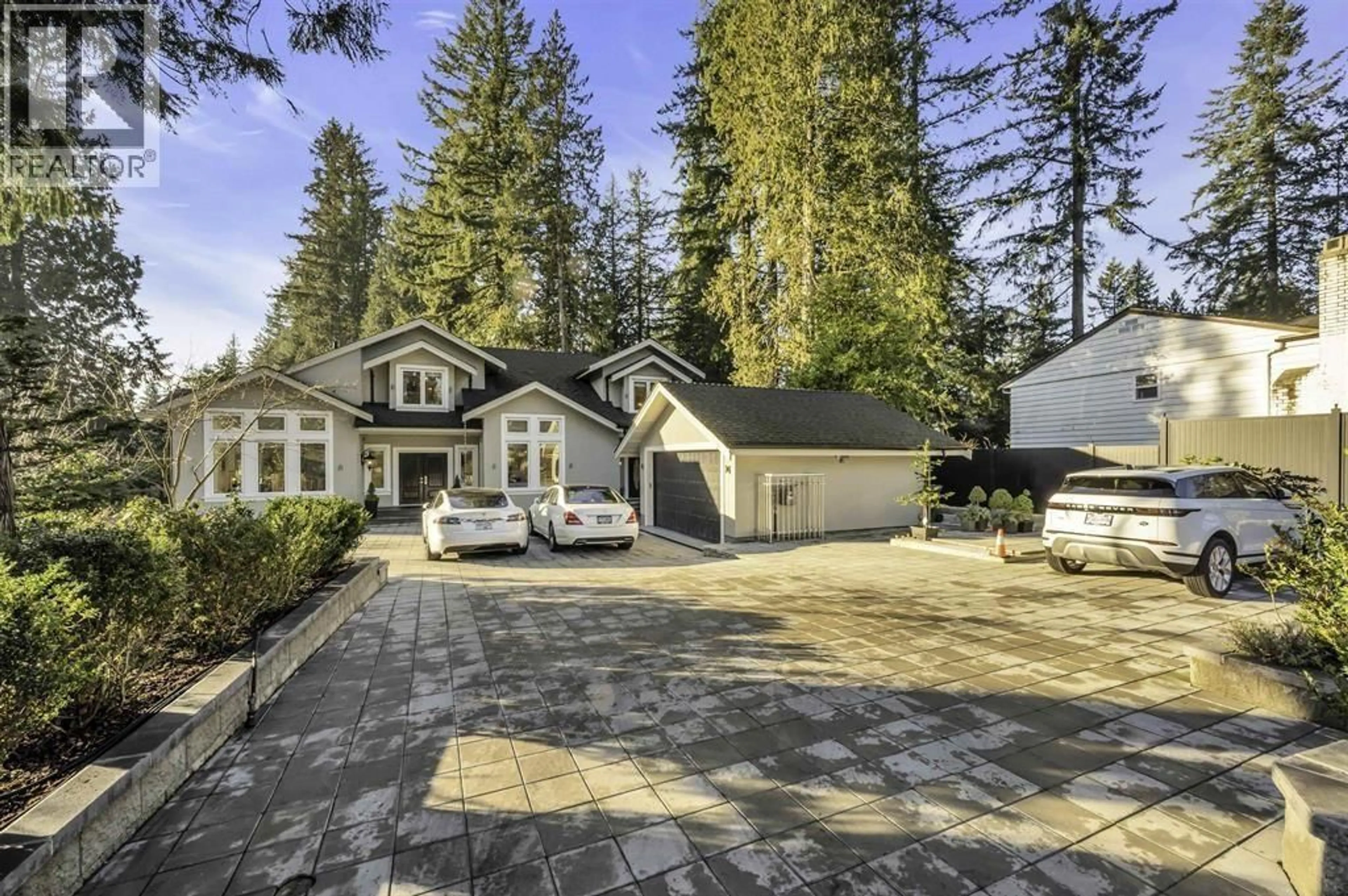 A pic from outside/outdoor area/front of a property/back of a property/a pic from drone, street for 4511 CAPILANO ROAD, North Vancouver British Columbia V7R4K2