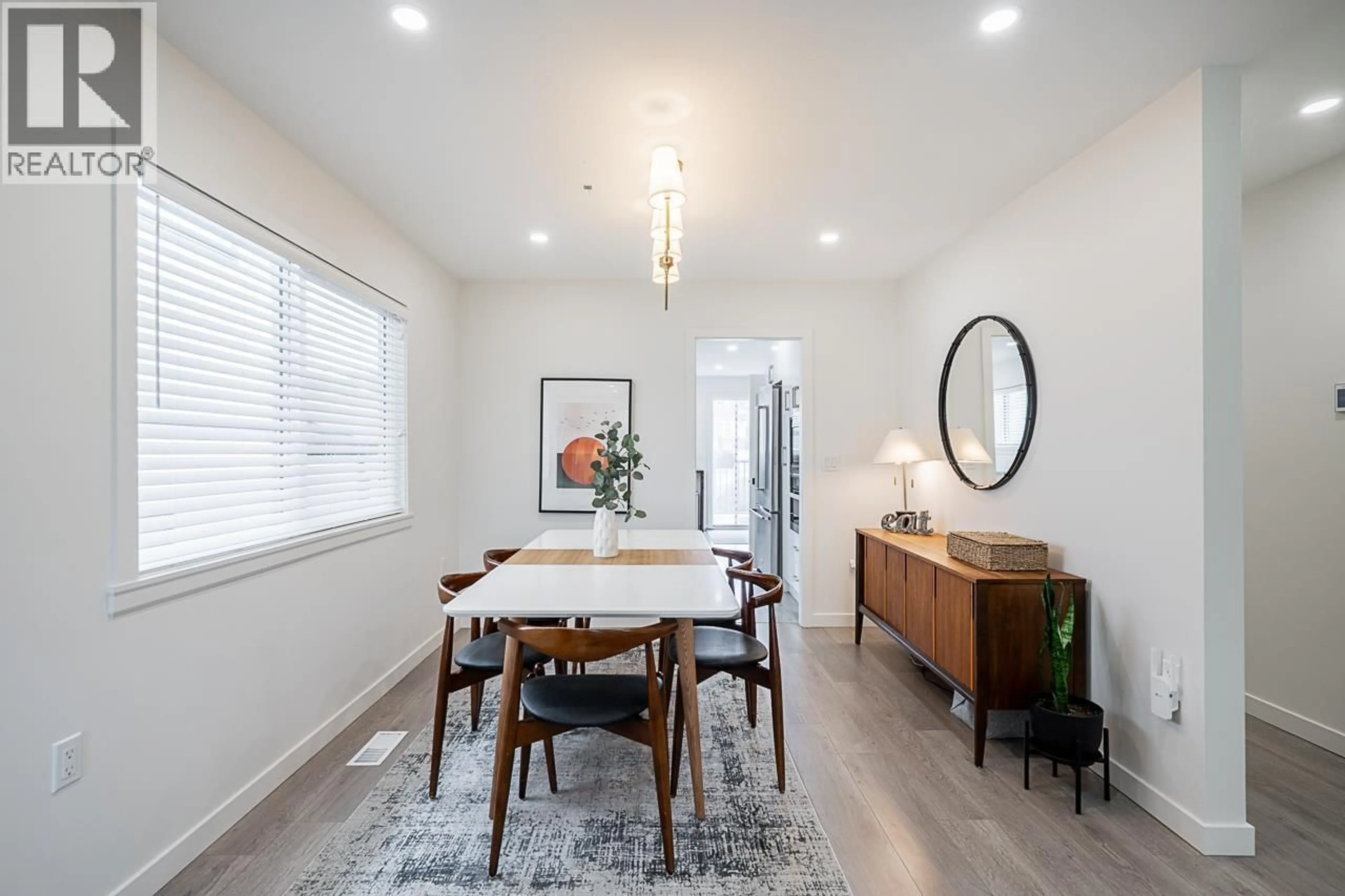 Dining room, wood/laminate floor for 1712 34 AVENUE, Vancouver British Columbia V5P1A3
