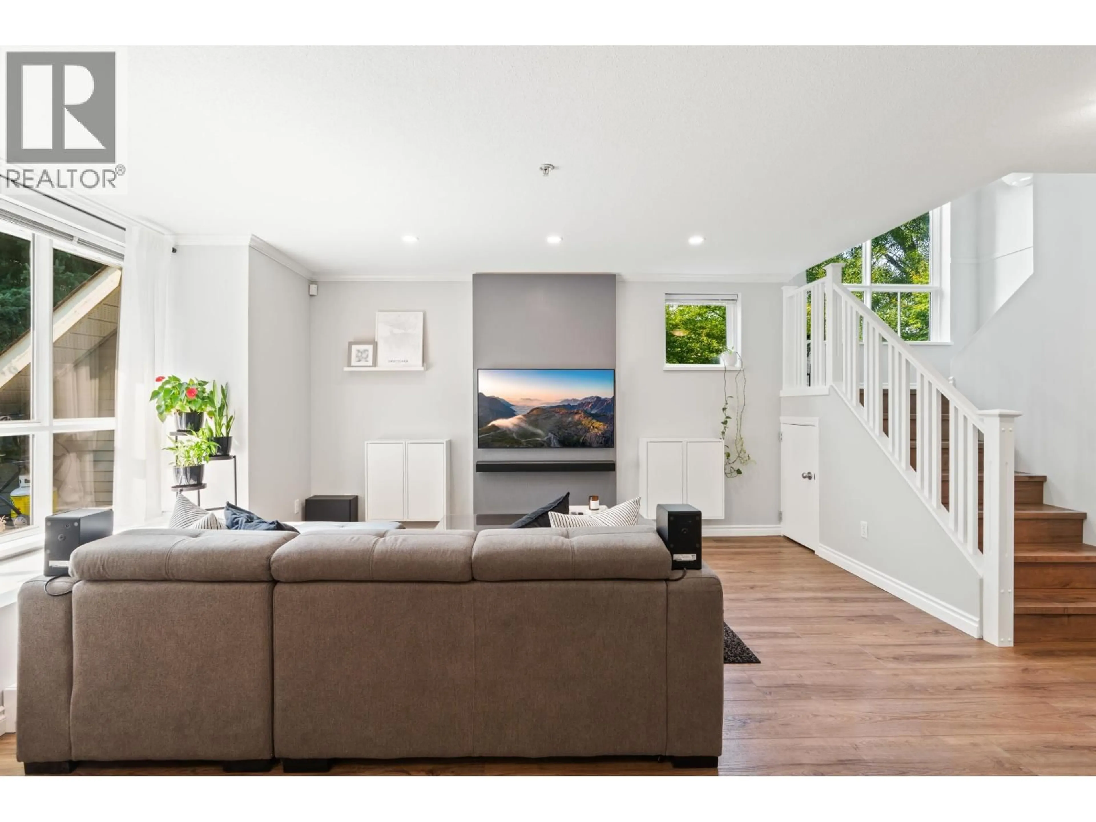 Living room with furniture, wood/laminate floor for 26 - 7128 STRIDE AVENUE, Burnaby British Columbia V3N1T5