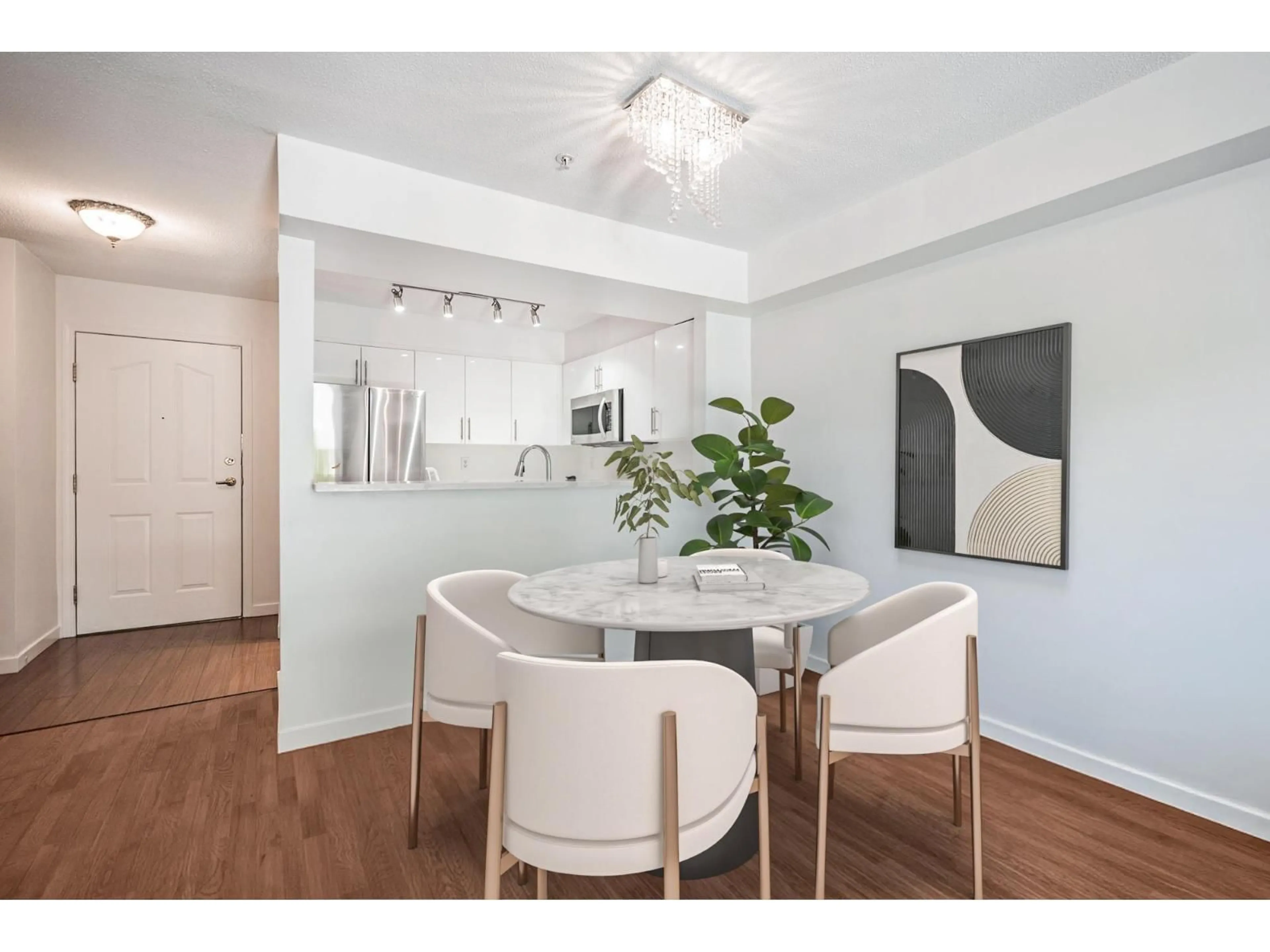 Dining room, wood/laminate floor for 217 - 8110 120A, Surrey British Columbia V3W3P3