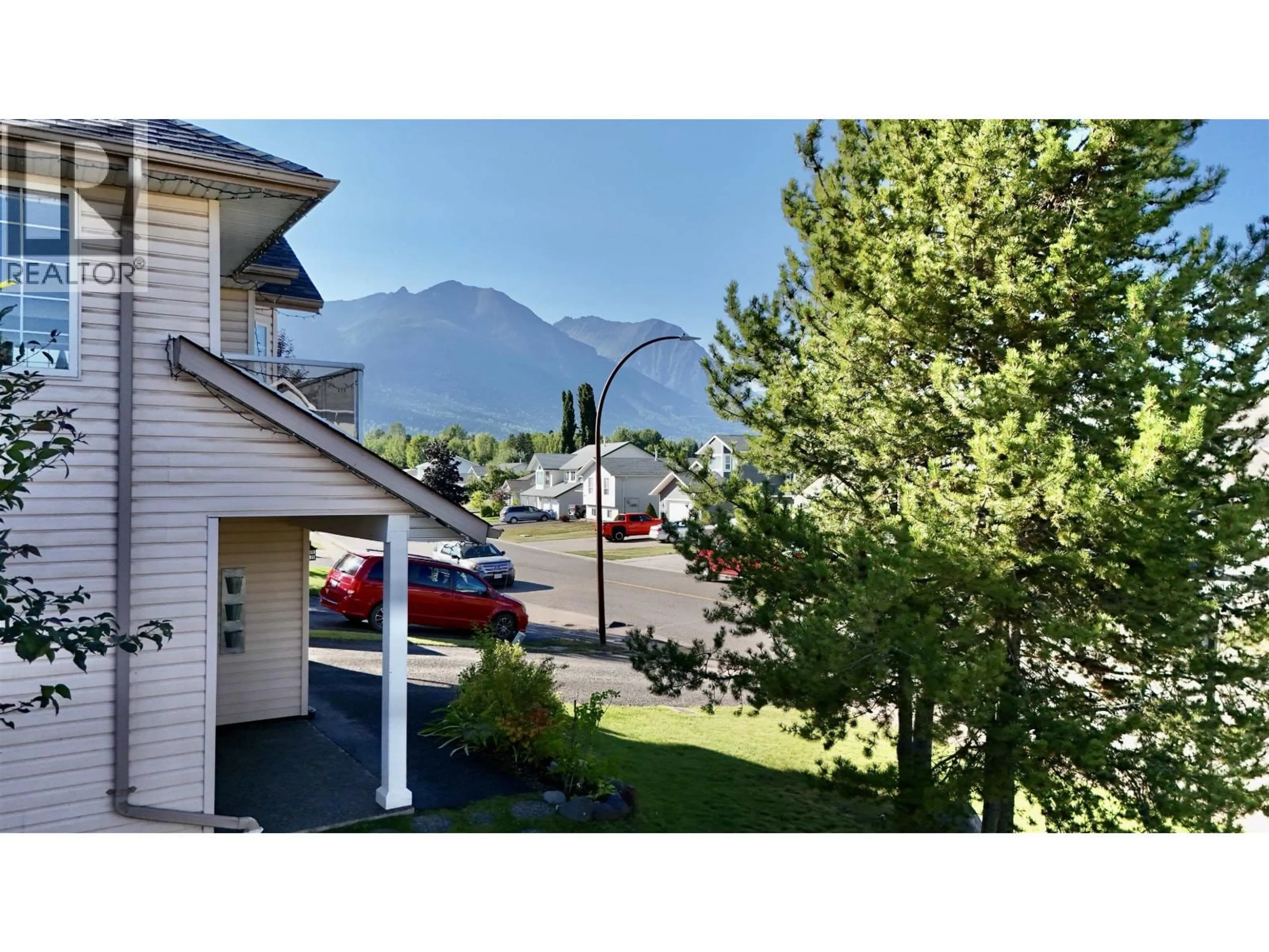 A pic from outside/outdoor area/front of a property/back of a property/a pic from drone, mountain view for 1471 DRIFTWOOD CRESCENT, Smithers British Columbia V0J2N0