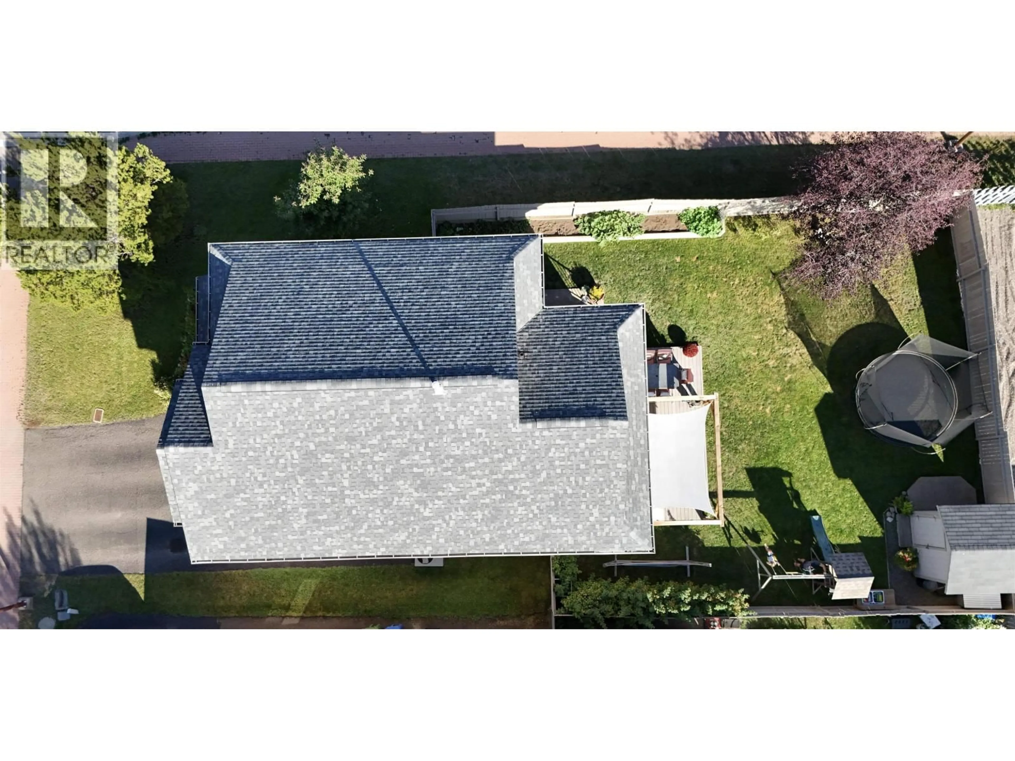 A pic from outside/outdoor area/front of a property/back of a property/a pic from drone, street for 1471 DRIFTWOOD CRESCENT, Smithers British Columbia V0J2N0
