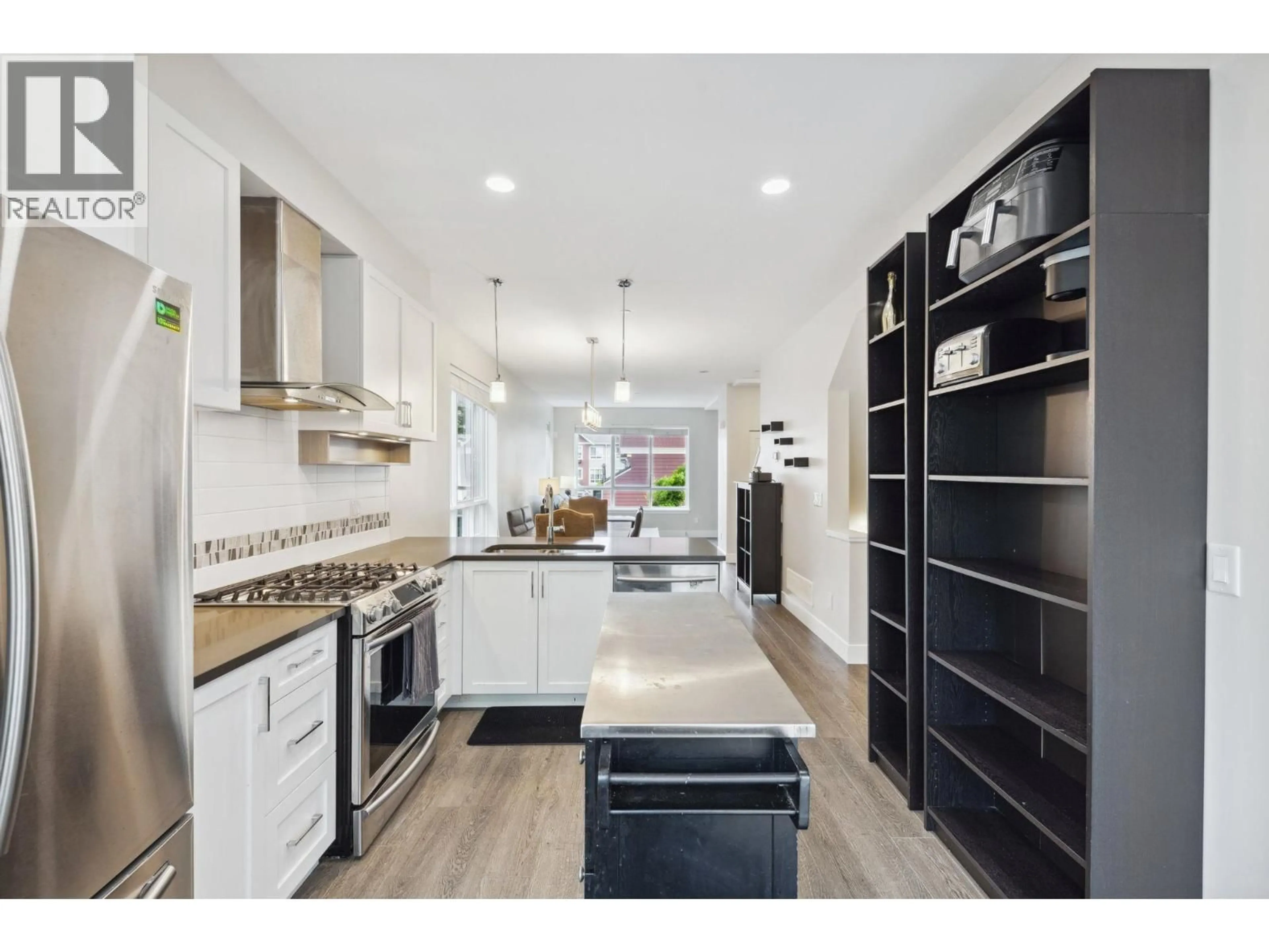 Open concept kitchen, ceramic/tile floor for 511 - 4688 HAWK LANE, Delta British Columbia V4M0B7