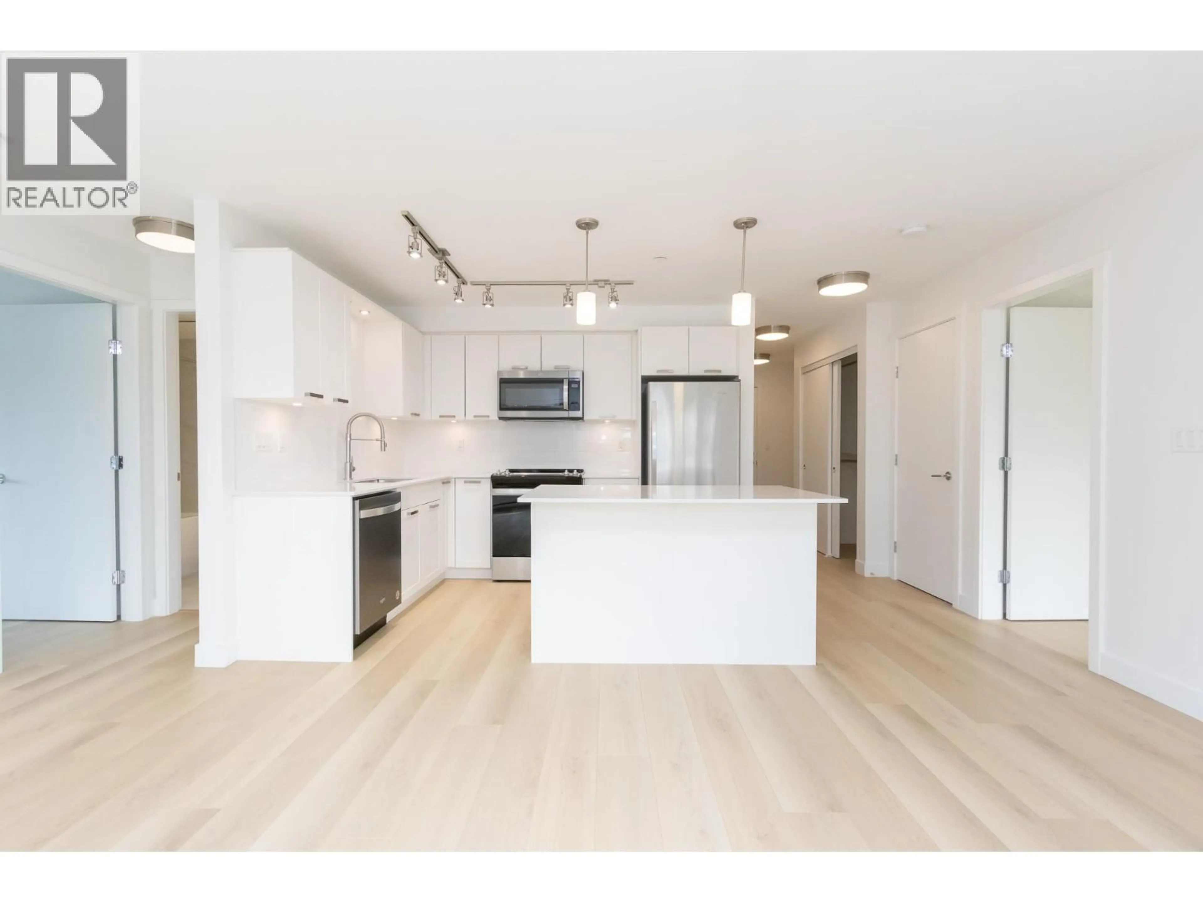 Open concept kitchen, unknown for 213 - 22562 121 AVENUE, Maple Ridge British Columbia V2X3Y8