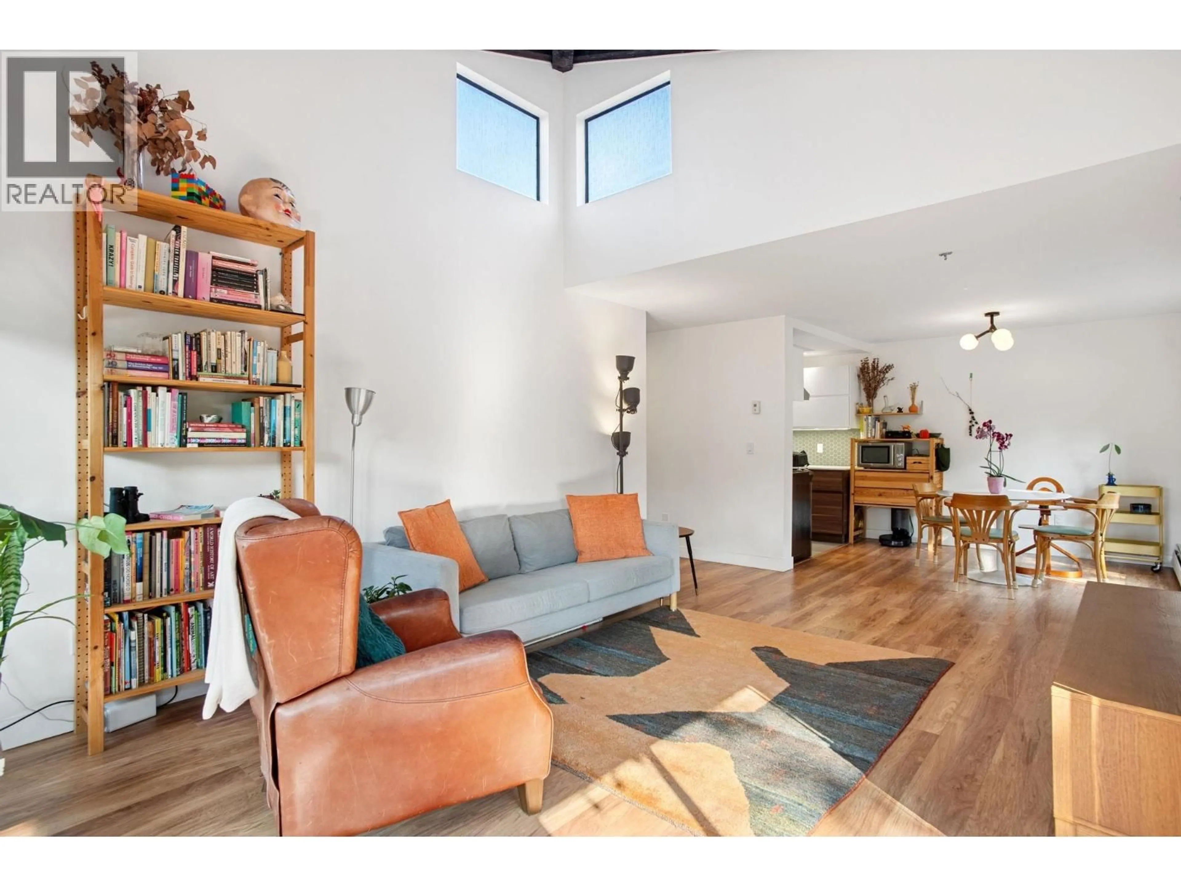 Living room with furniture, wood/laminate floor for 303 - 2277 MCGILL STREET, Vancouver British Columbia V5L1C3