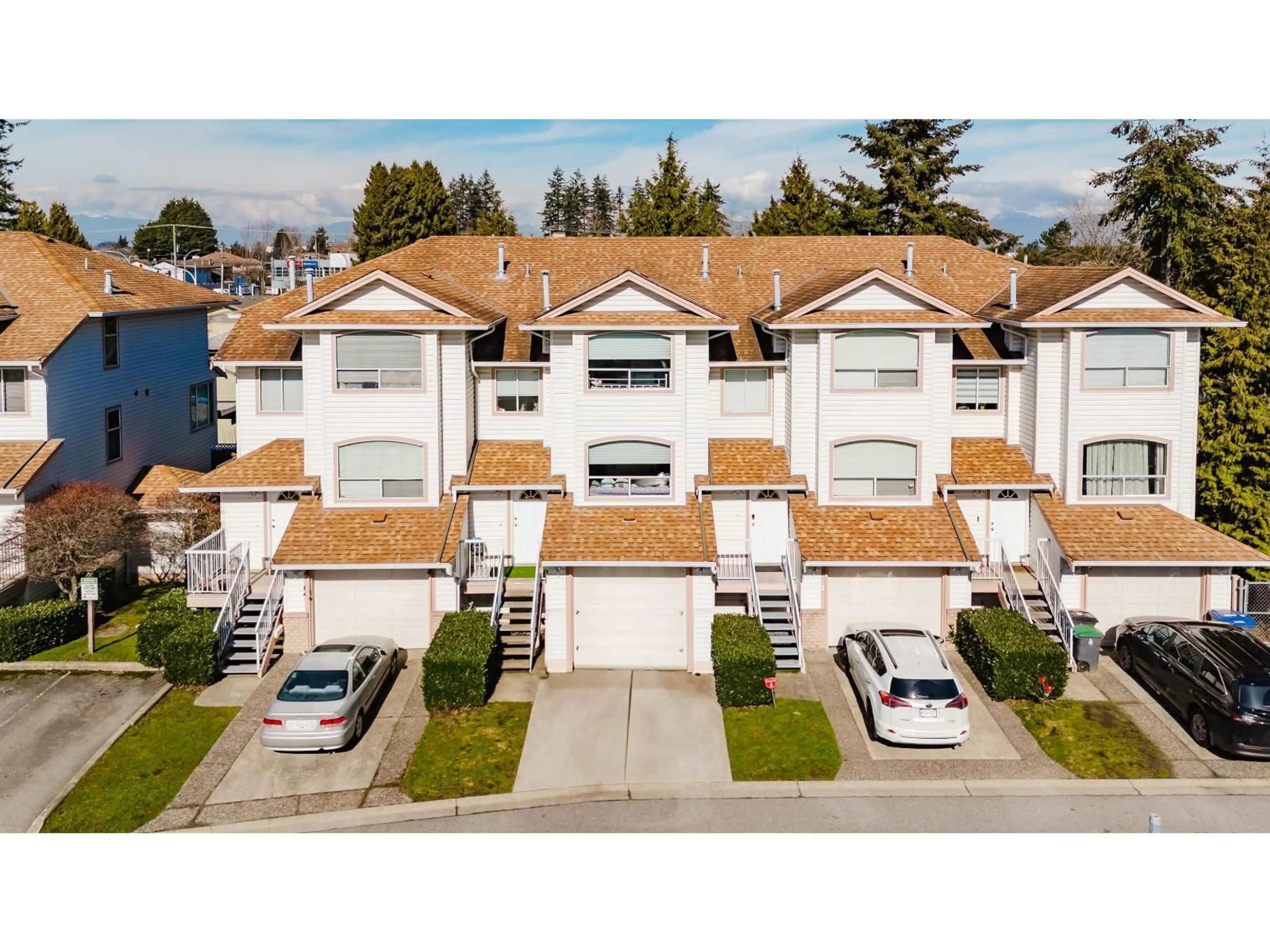 A pic from outside/outdoor area/front of a property/back of a property/a pic from drone, street for 9 - 7140 132, Surrey British Columbia V3W1J5
