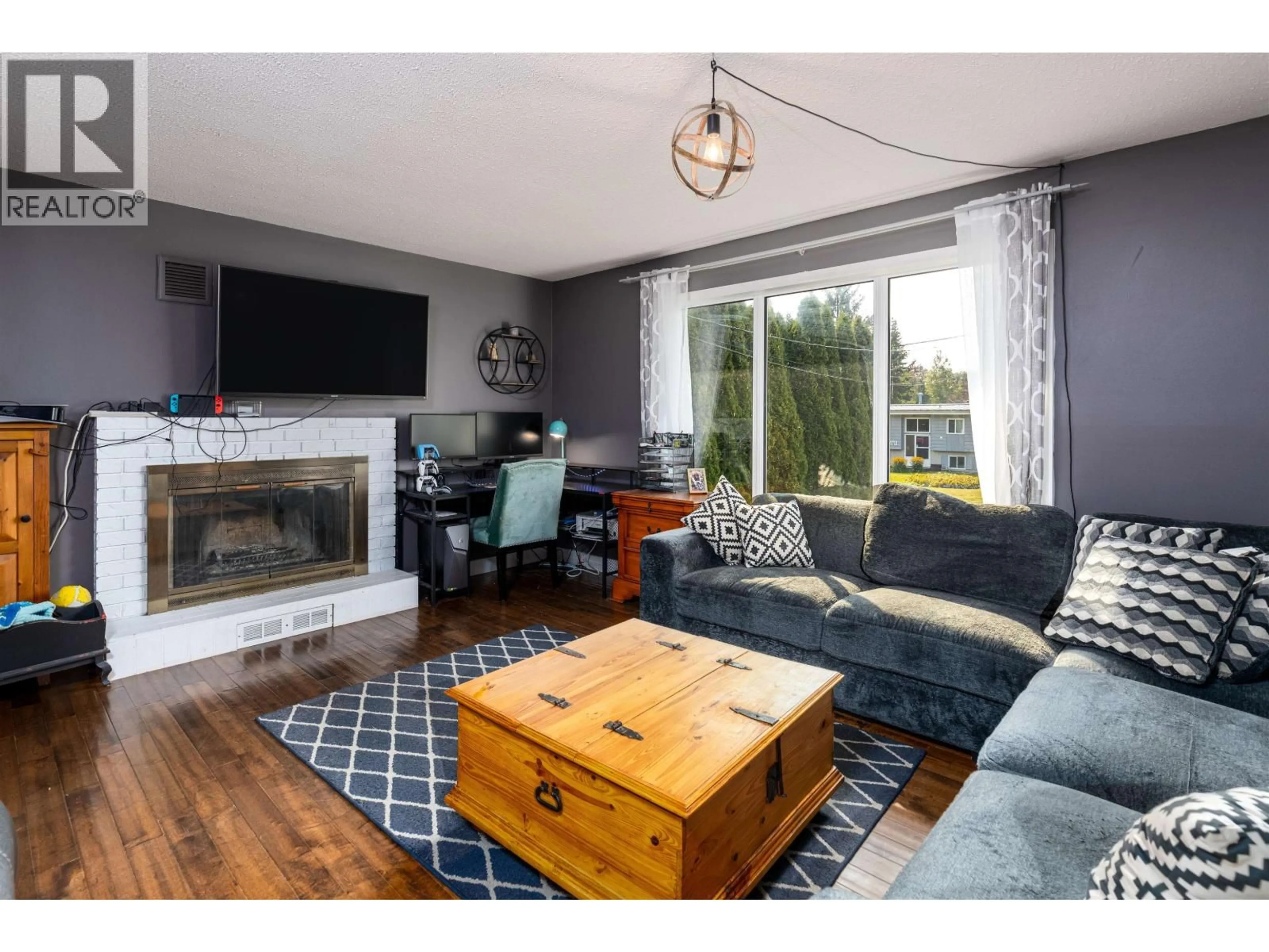 Living room with furniture, wood/laminate floor for 4714 MCCONNELL AVENUE, Terrace British Columbia V8G2G8