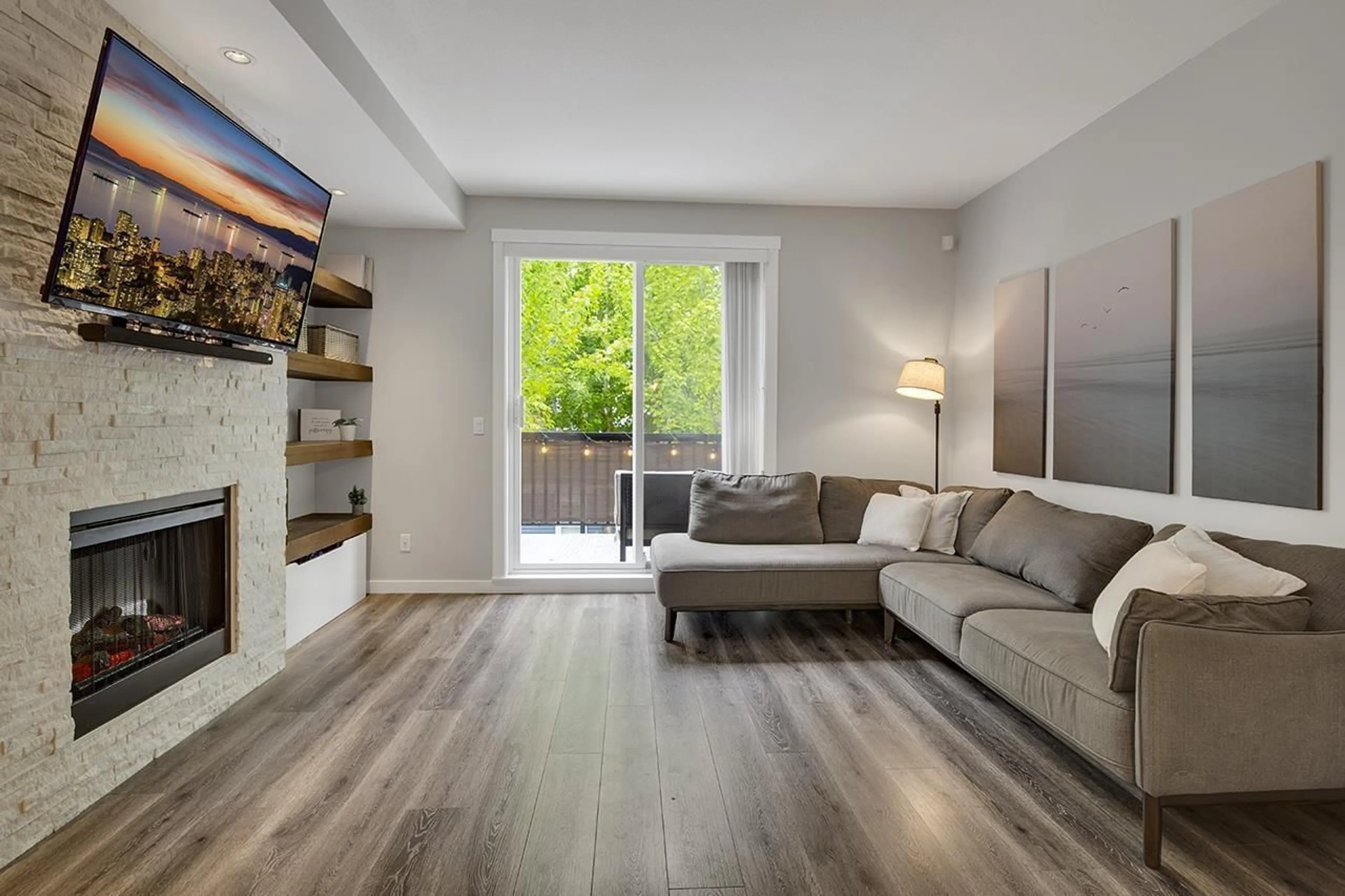 Living room with furniture, wood/laminate floor for 33 - 18983 72A, Surrey British Columbia V4N1A5