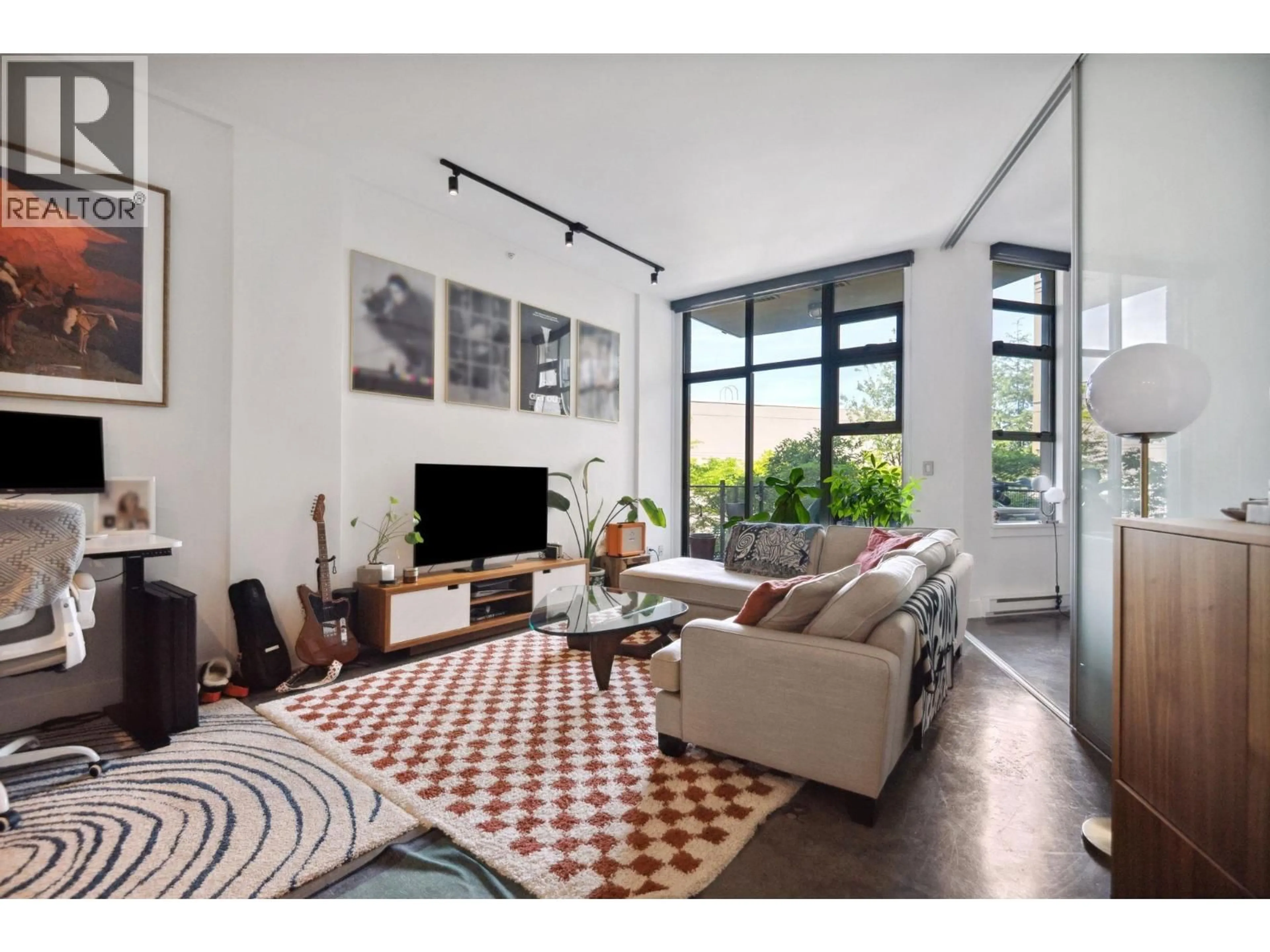 Living room with furniture, unknown for 209 - 2635 PRINCE EDWARD STREET, Vancouver British Columbia V5T4V7