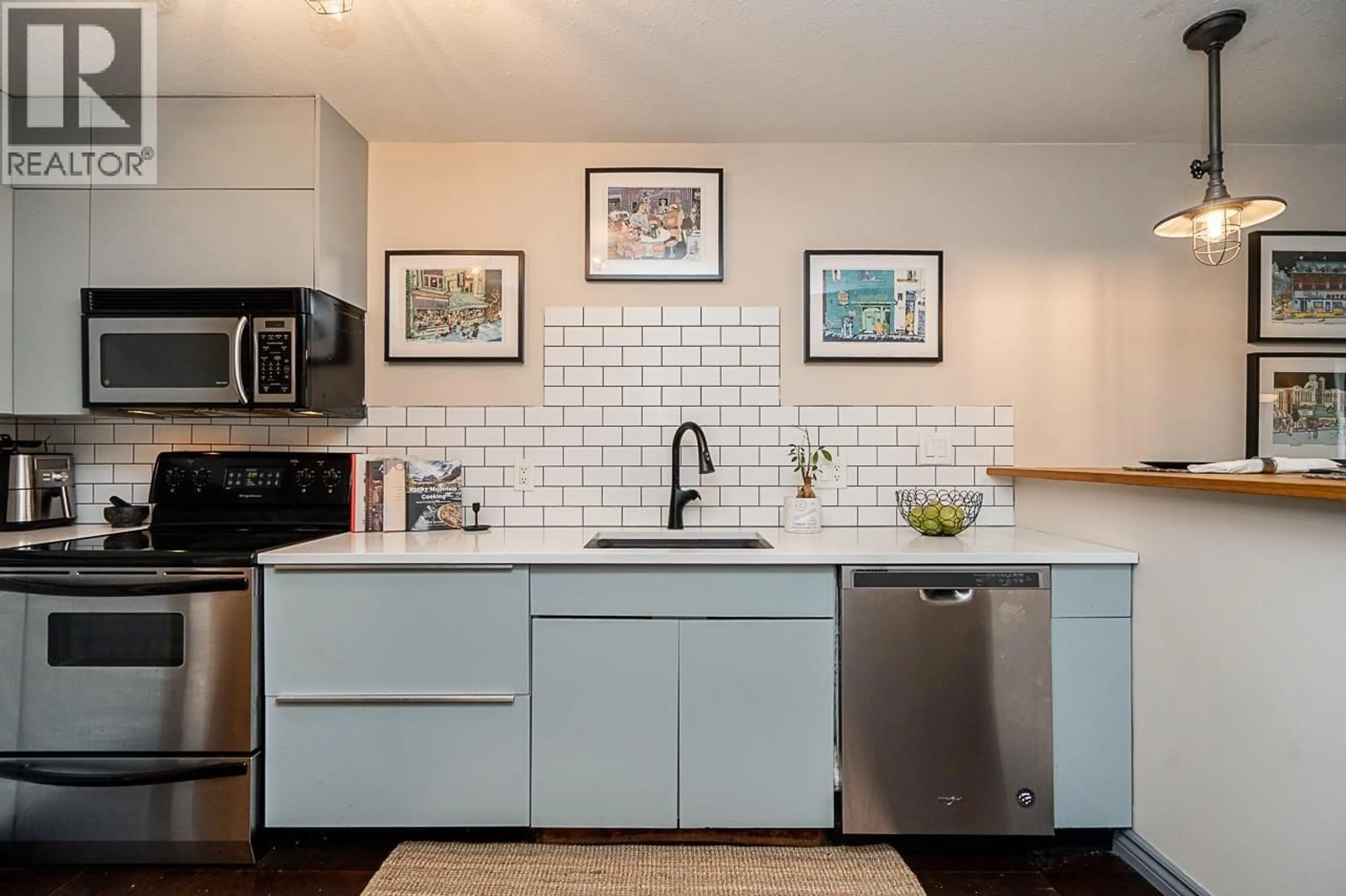 Open concept kitchen, ceramic/tile floor for 105 - 2255 ETON STREET, Vancouver British Columbia V5L1C9