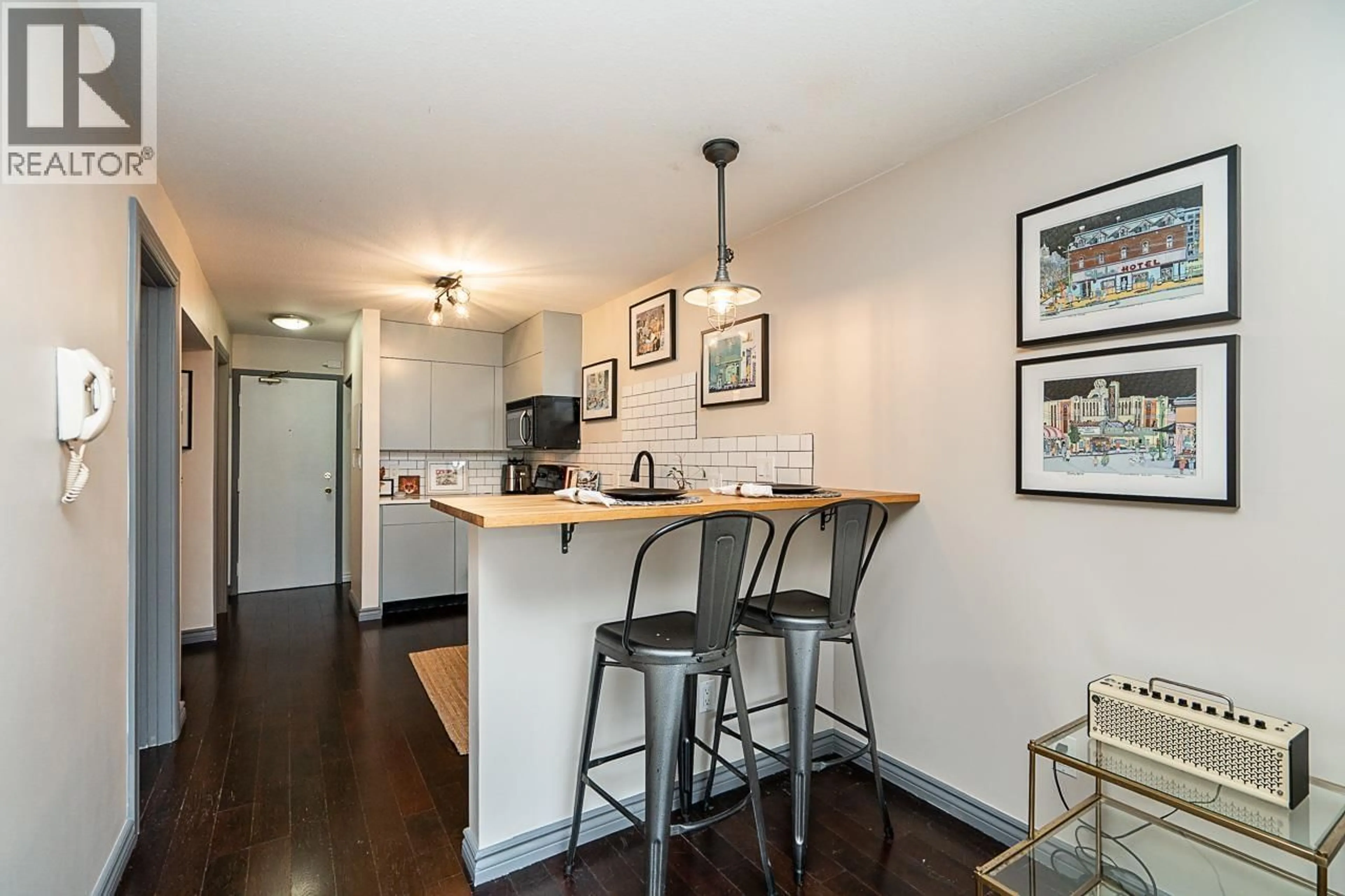 Open concept kitchen, wood/laminate floor for 105 - 2255 ETON STREET, Vancouver British Columbia V5L1C9