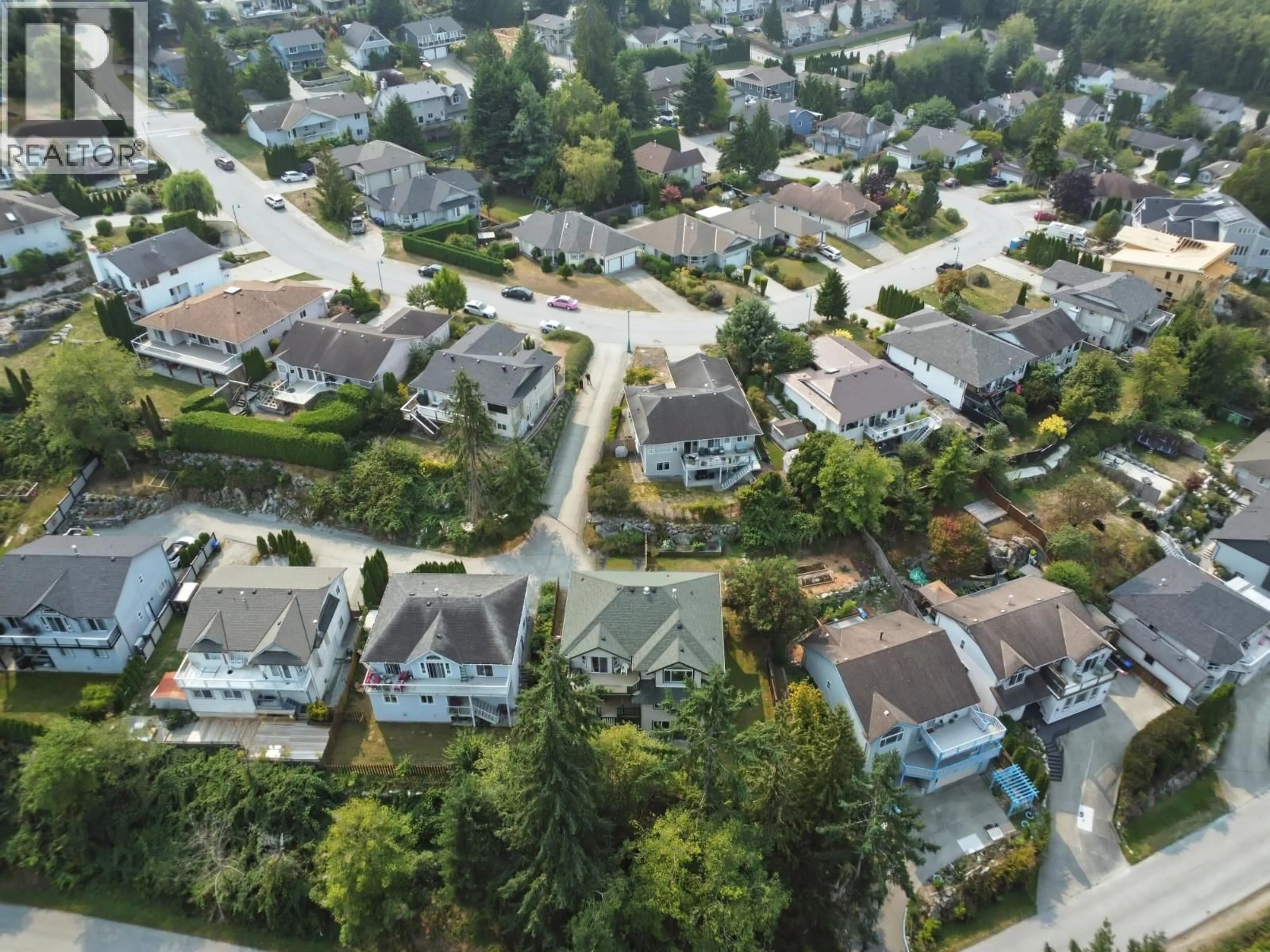 A pic from outside/outdoor area/front of a property/back of a property/a pic from drone, street for 5866A TURNSTONE CRESCENT, Sechelt British Columbia V7Z0L9