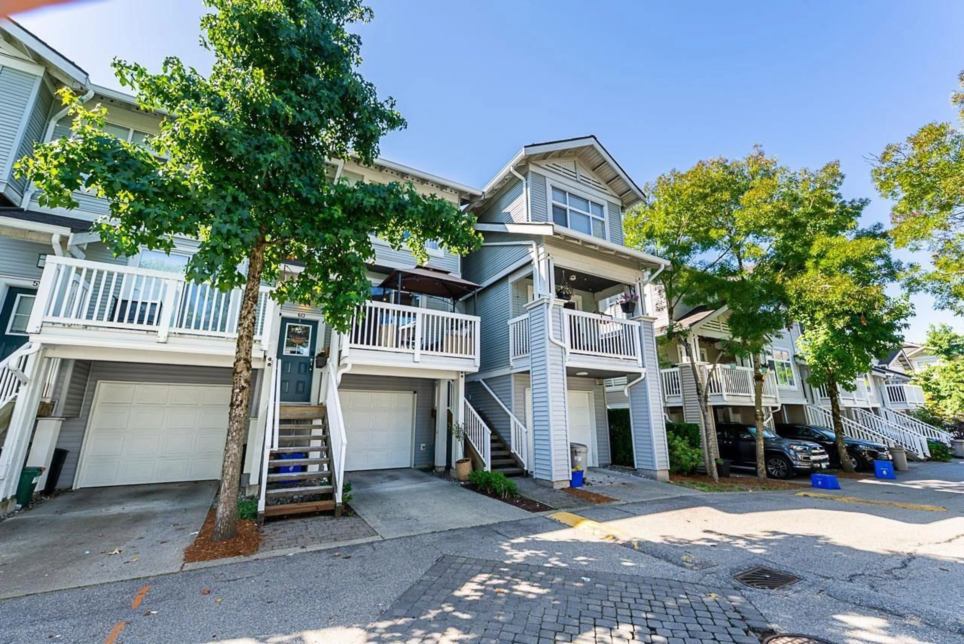 A pic from outside/outdoor area/front of a property/back of a property/a pic from drone, street for 60 - 7179 201, Langley British Columbia V2Y2Y9