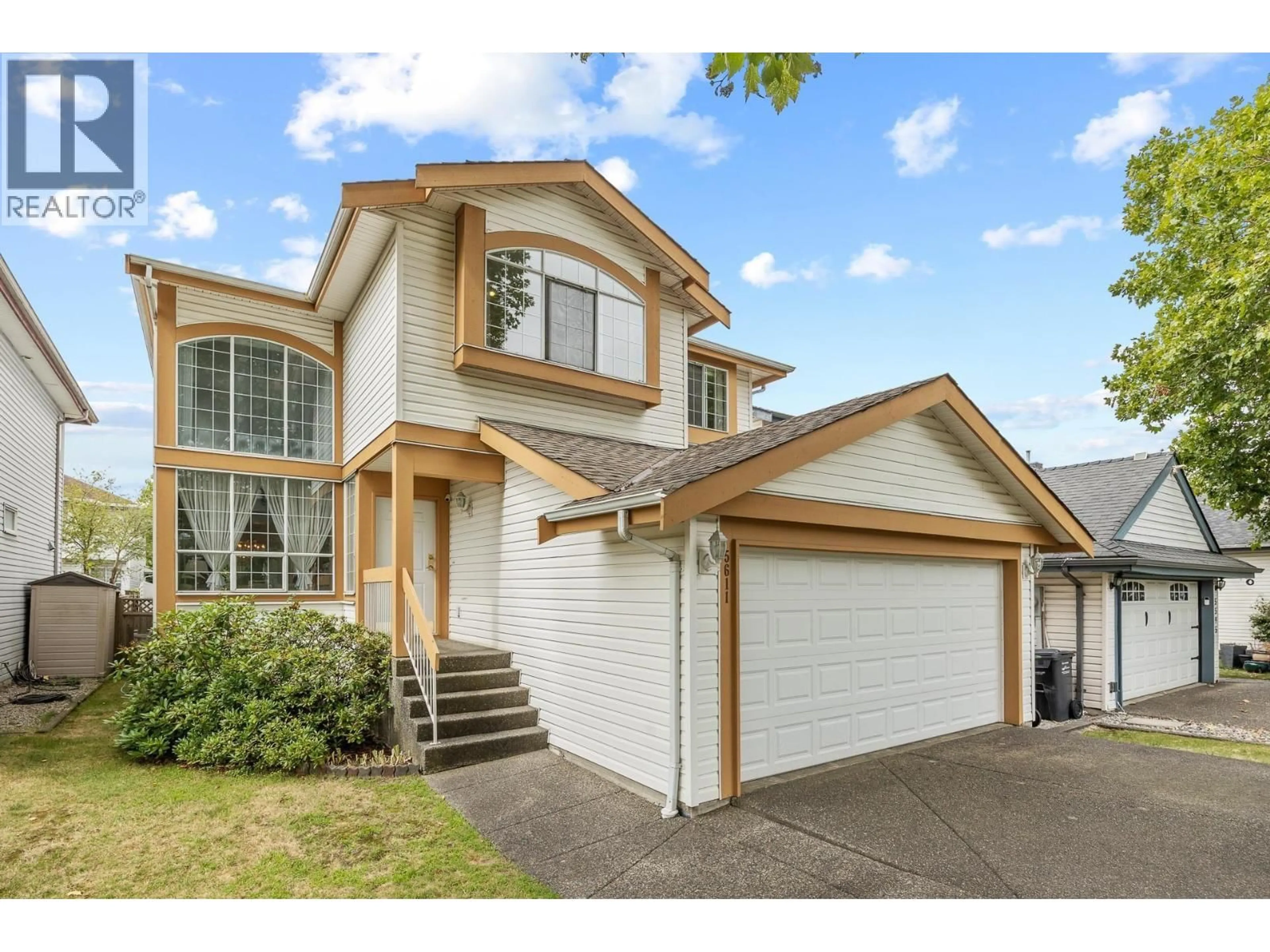 Home with vinyl exterior material, street for 5611 MCRAE STREET, Richmond British Columbia V6V2P5
