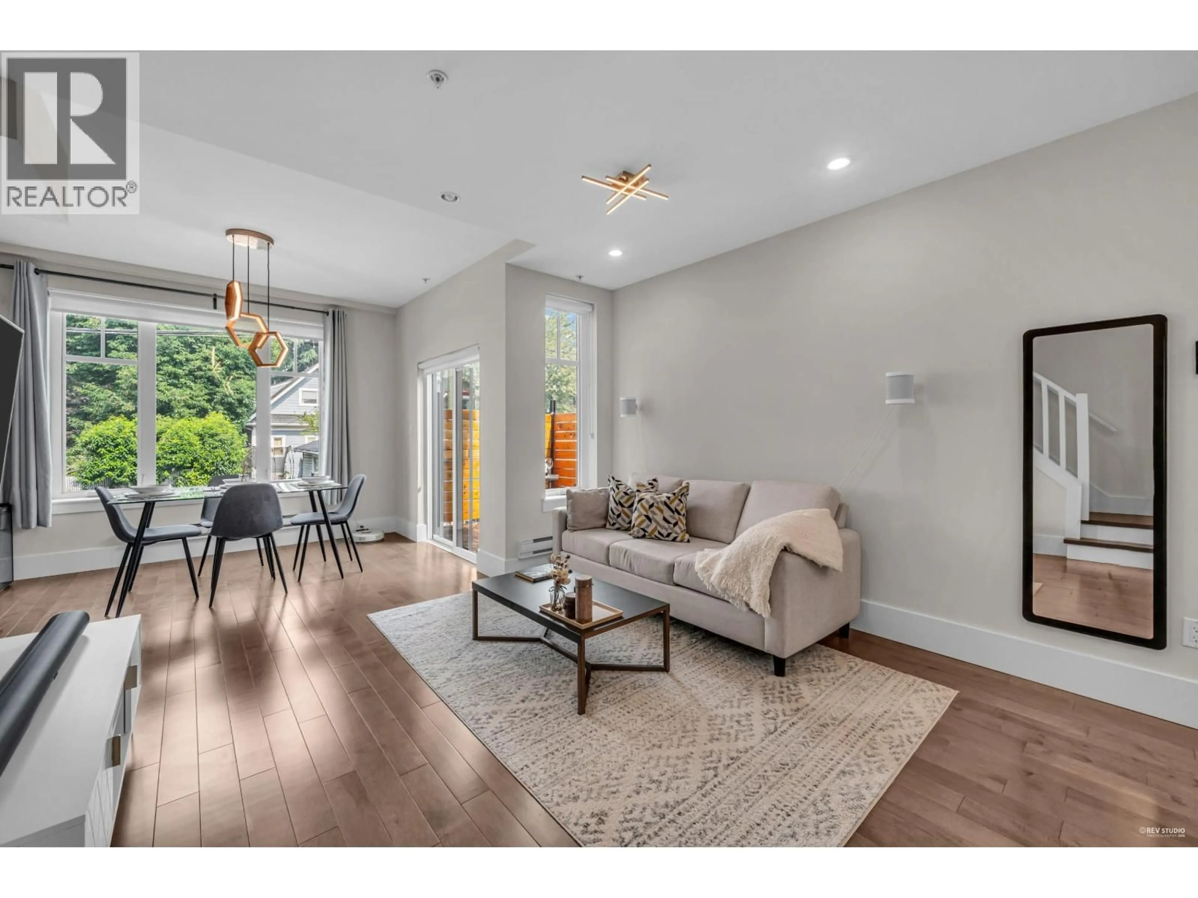 Living room with furniture, wood/laminate floor for 333 7TH AVENUE, Vancouver British Columbia V5T1M9