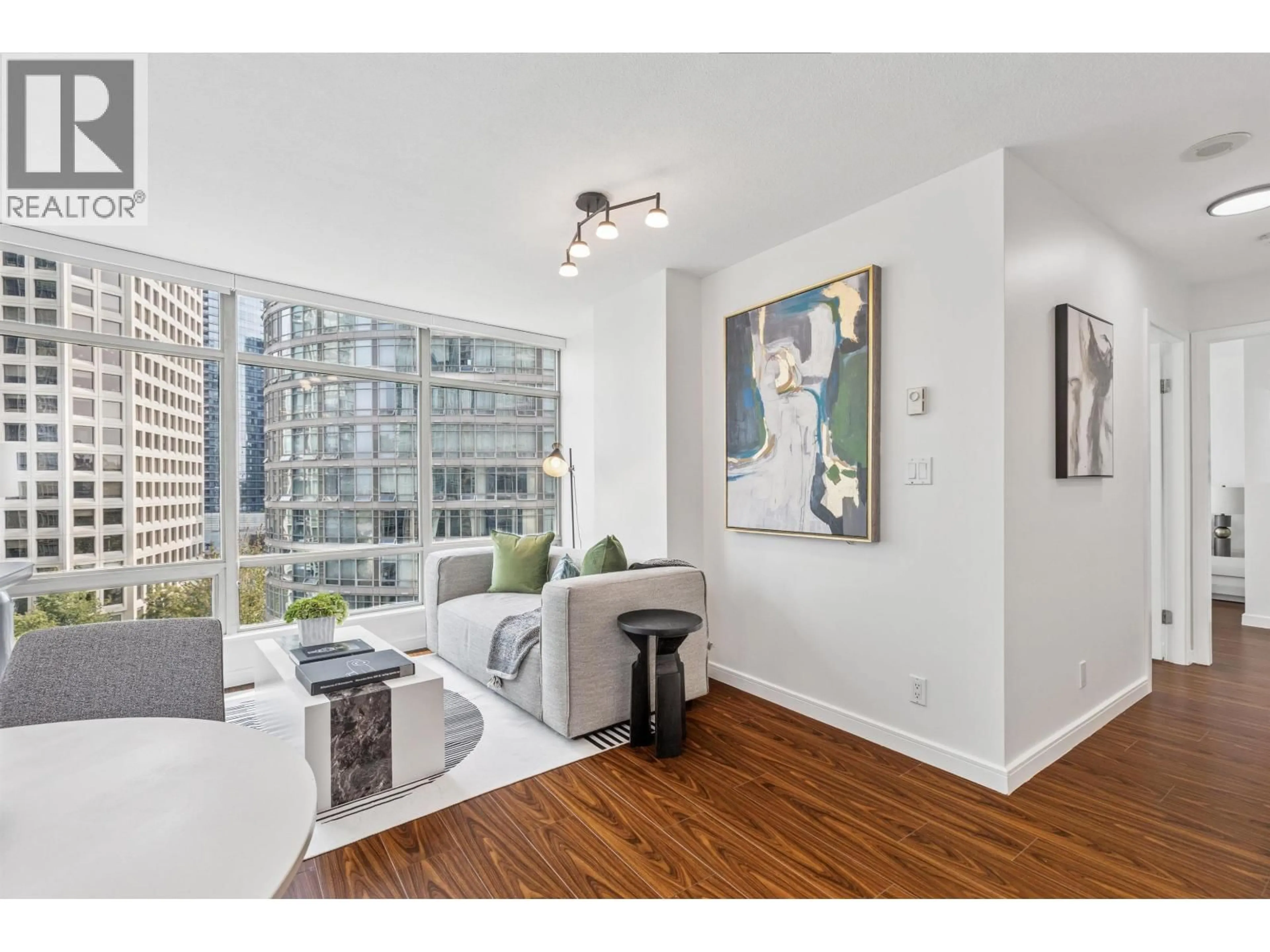 Living room with furniture, wood/laminate floor for 901 - 1288 ALBERNI STREET, Vancouver British Columbia V6E4N5