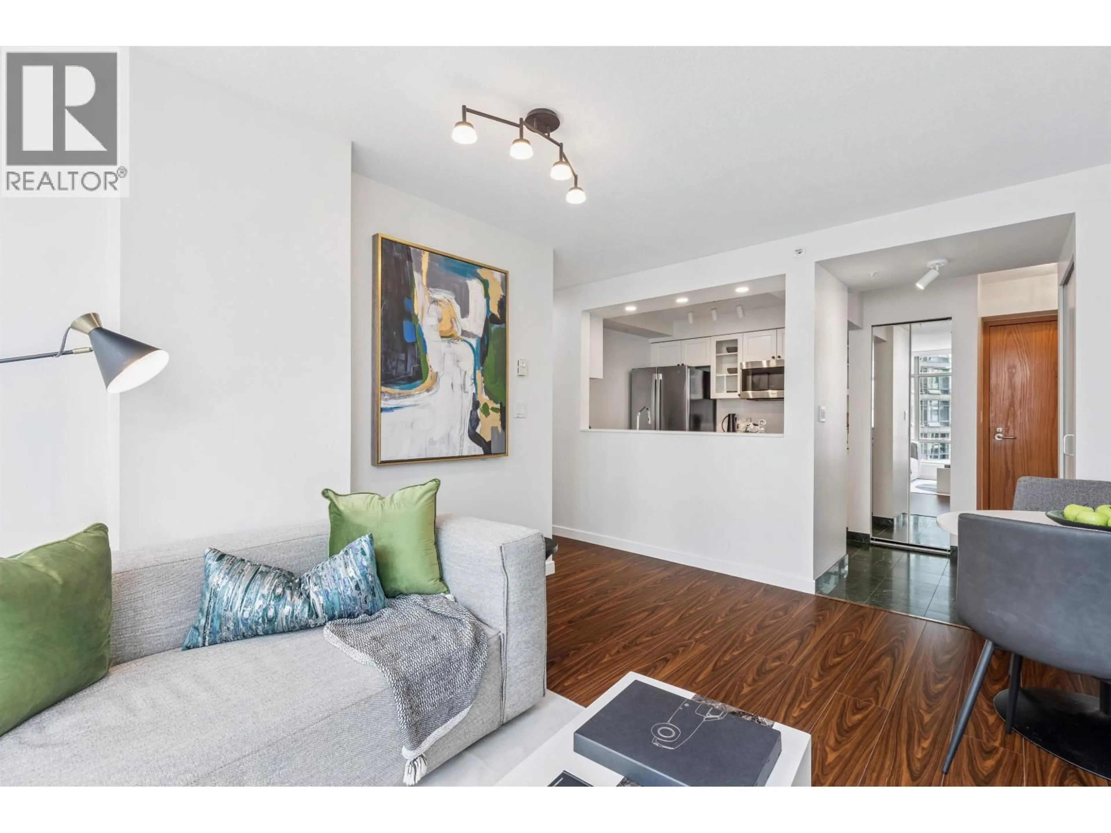 Living room with furniture, wood/laminate floor for 901 - 1288 ALBERNI STREET, Vancouver British Columbia V6E4N5
