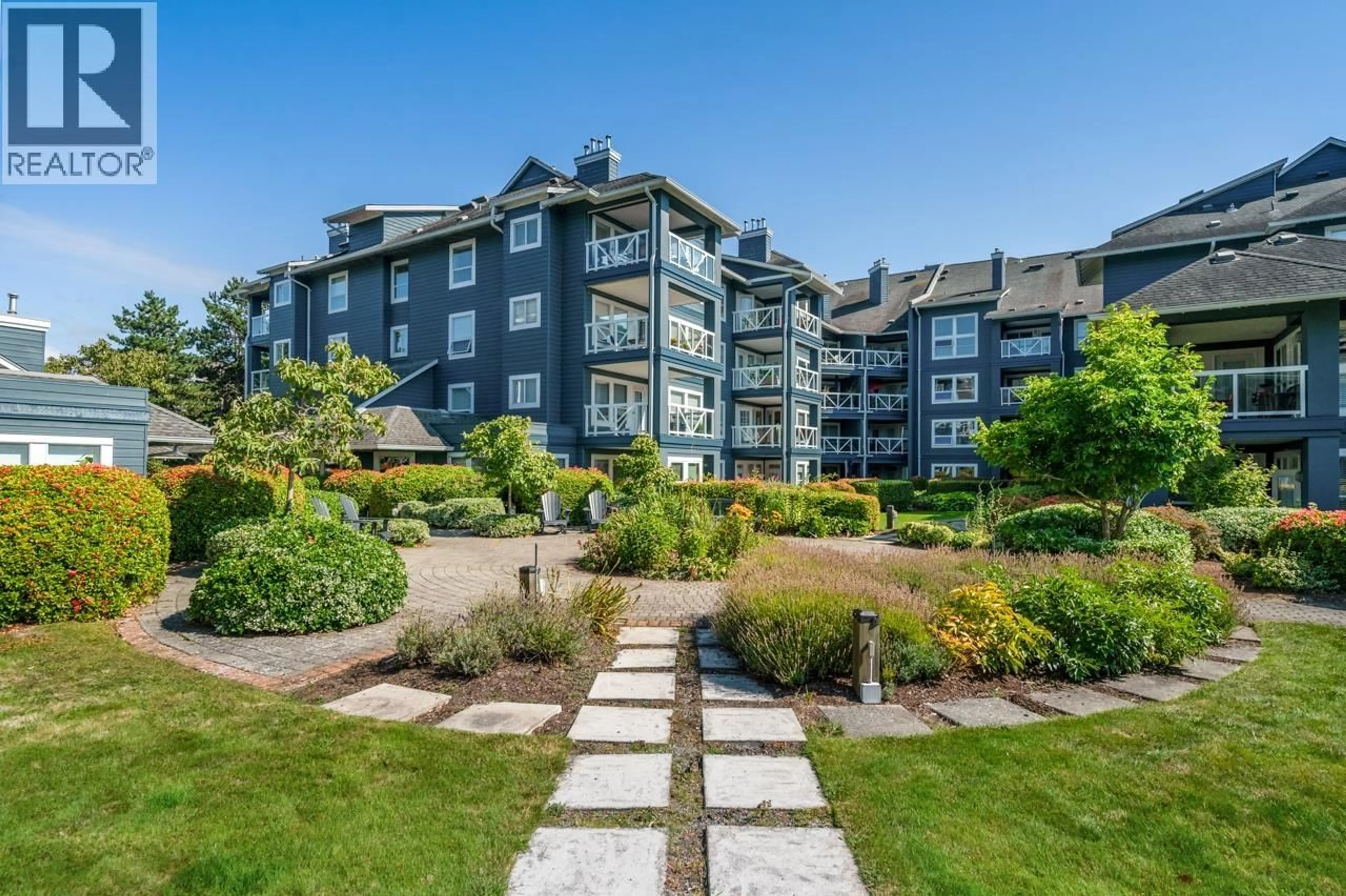 A pic from outside/outdoor area/front of a property/back of a property/a pic from drone, water/lake/river/ocean view for 210 - 12911 RAILWAY AVENUE, Richmond British Columbia V7E6L8