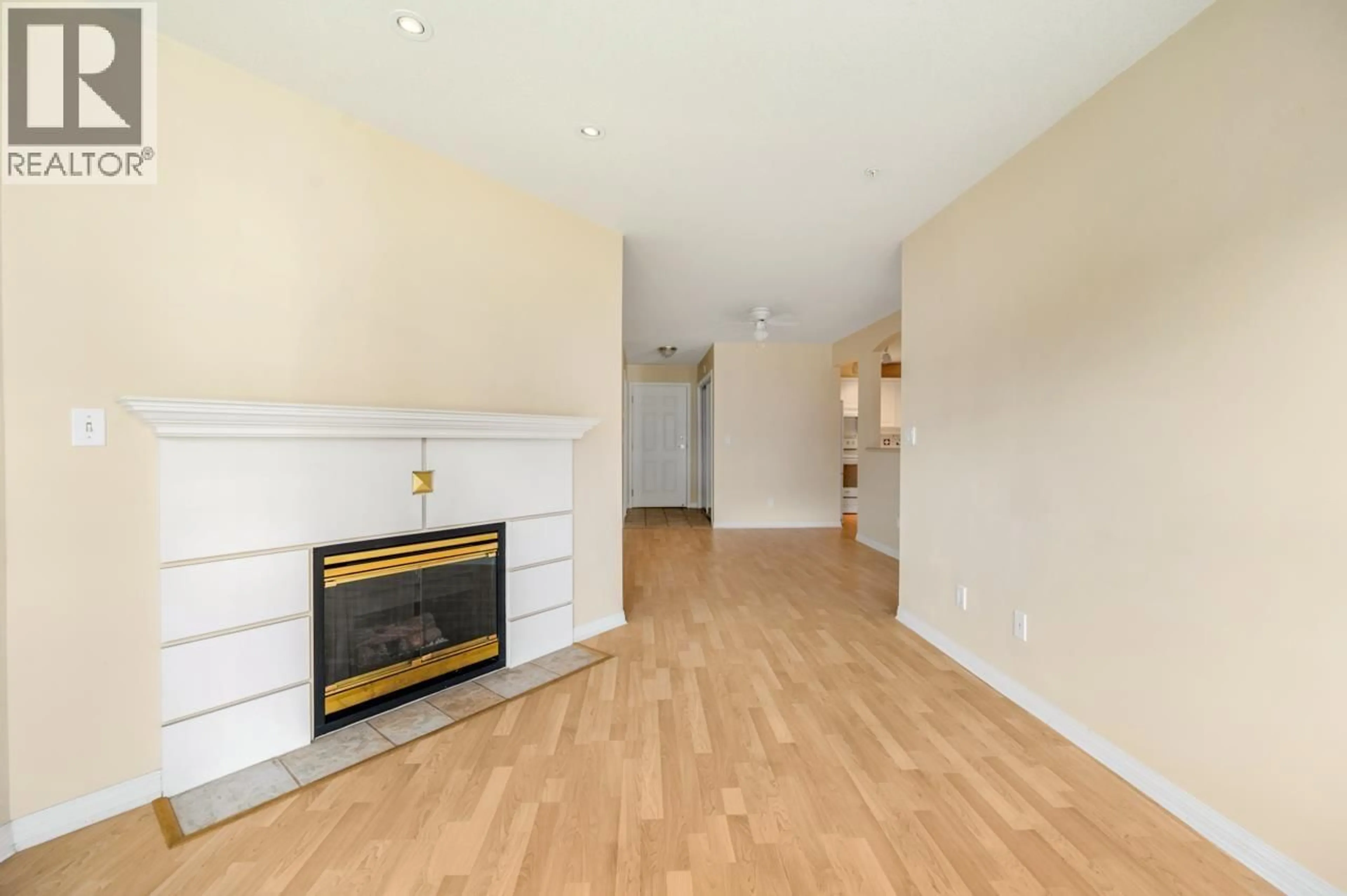 Living room with furniture, wood/laminate floor for 210 - 12911 RAILWAY AVENUE, Richmond British Columbia V7E6L8