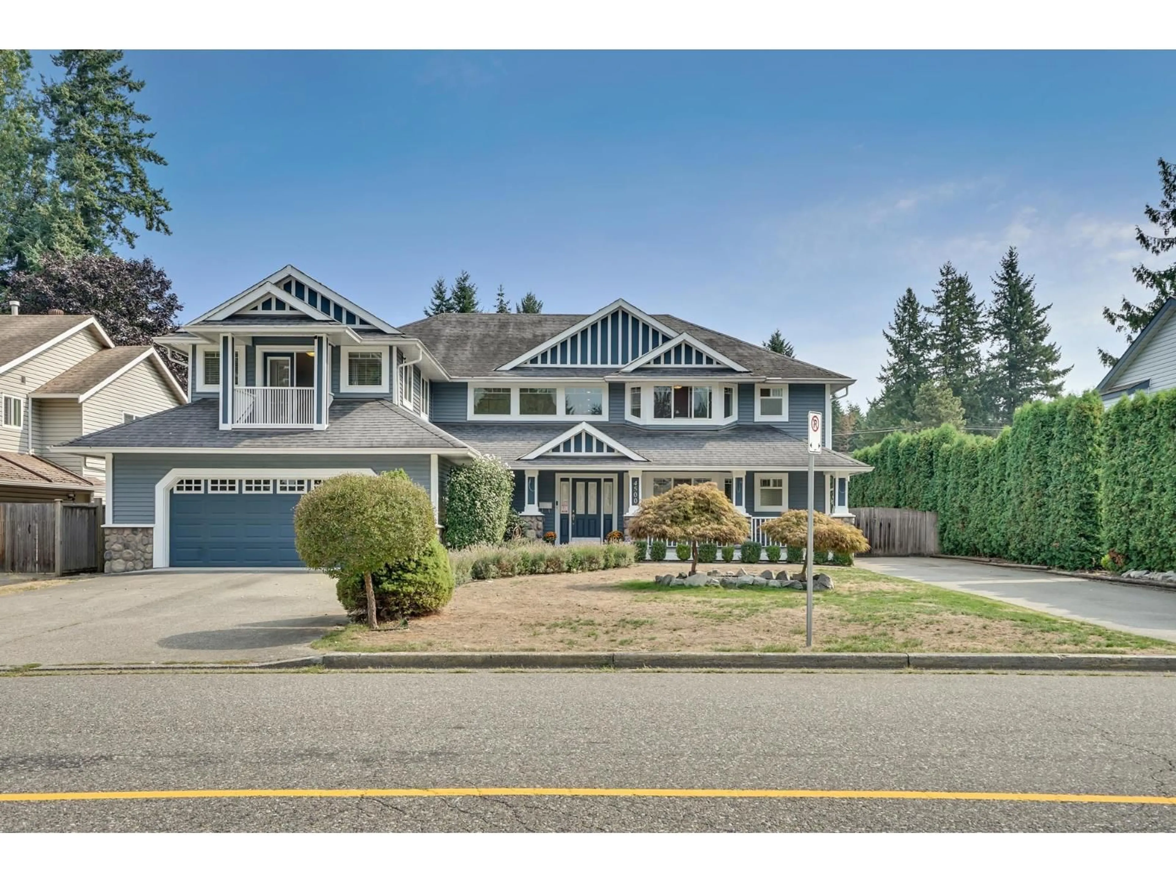 Home with vinyl exterior material, street for 4500 207A, Langley British Columbia V3A2G7