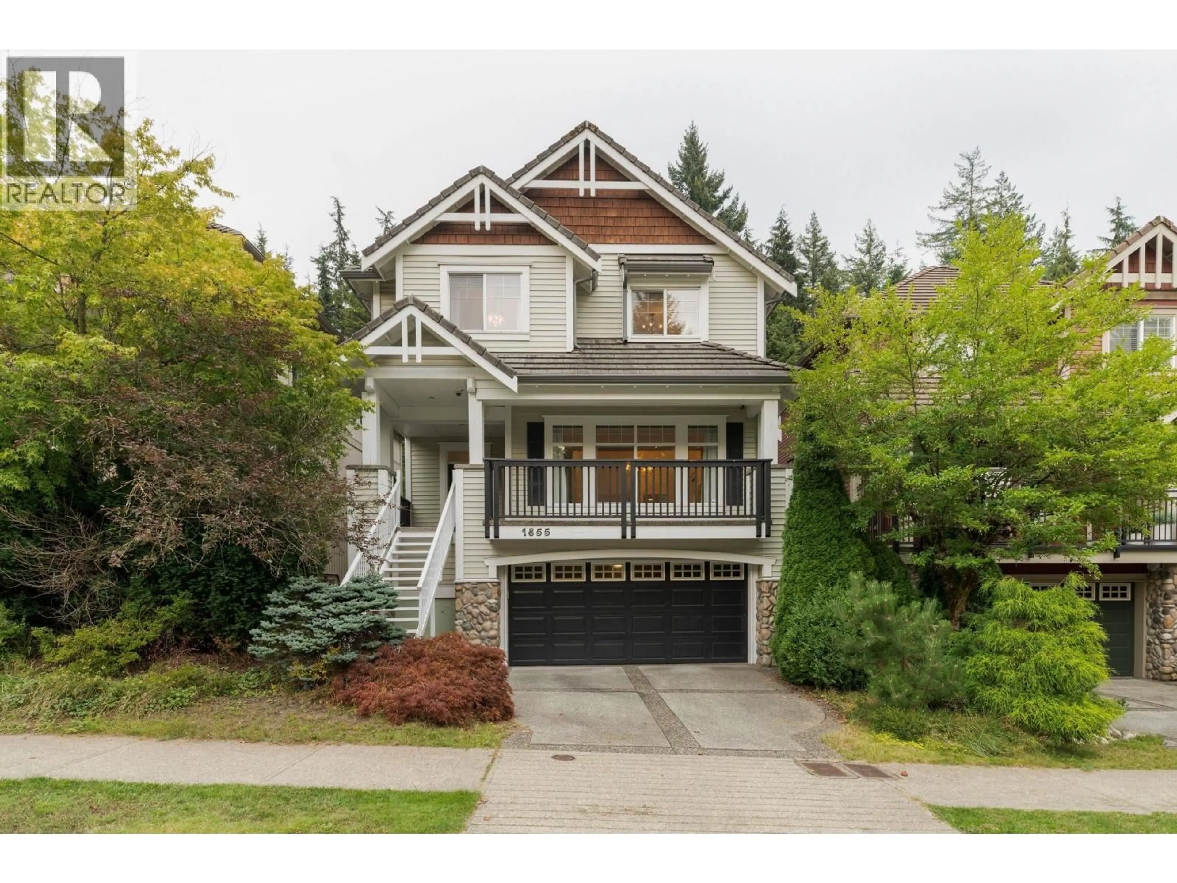 Home with vinyl exterior material, street for 1855 PARKWAY BOULEVARD, Coquitlam British Columbia V3E3L4