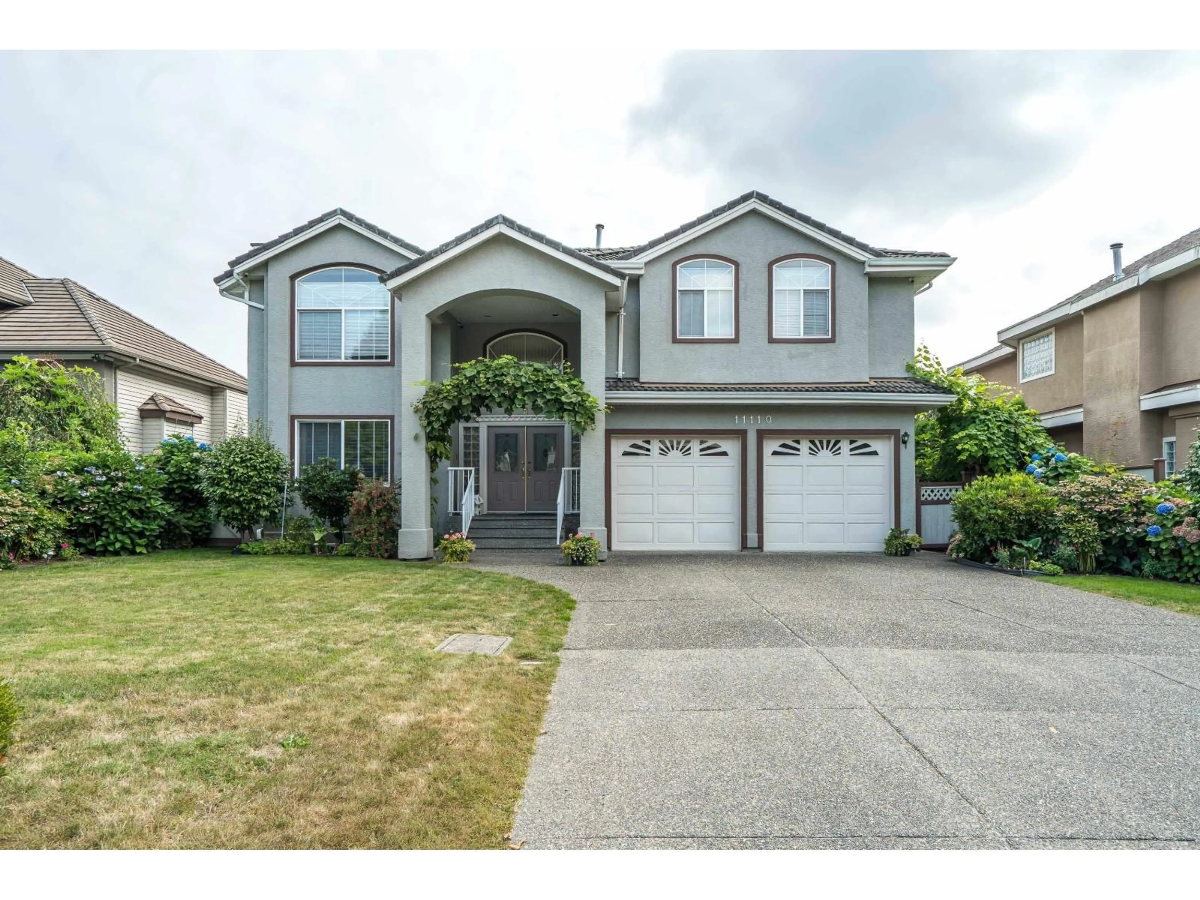 Home with vinyl exterior material, street for 11110 157A, Surrey British Columbia V4N4X1
