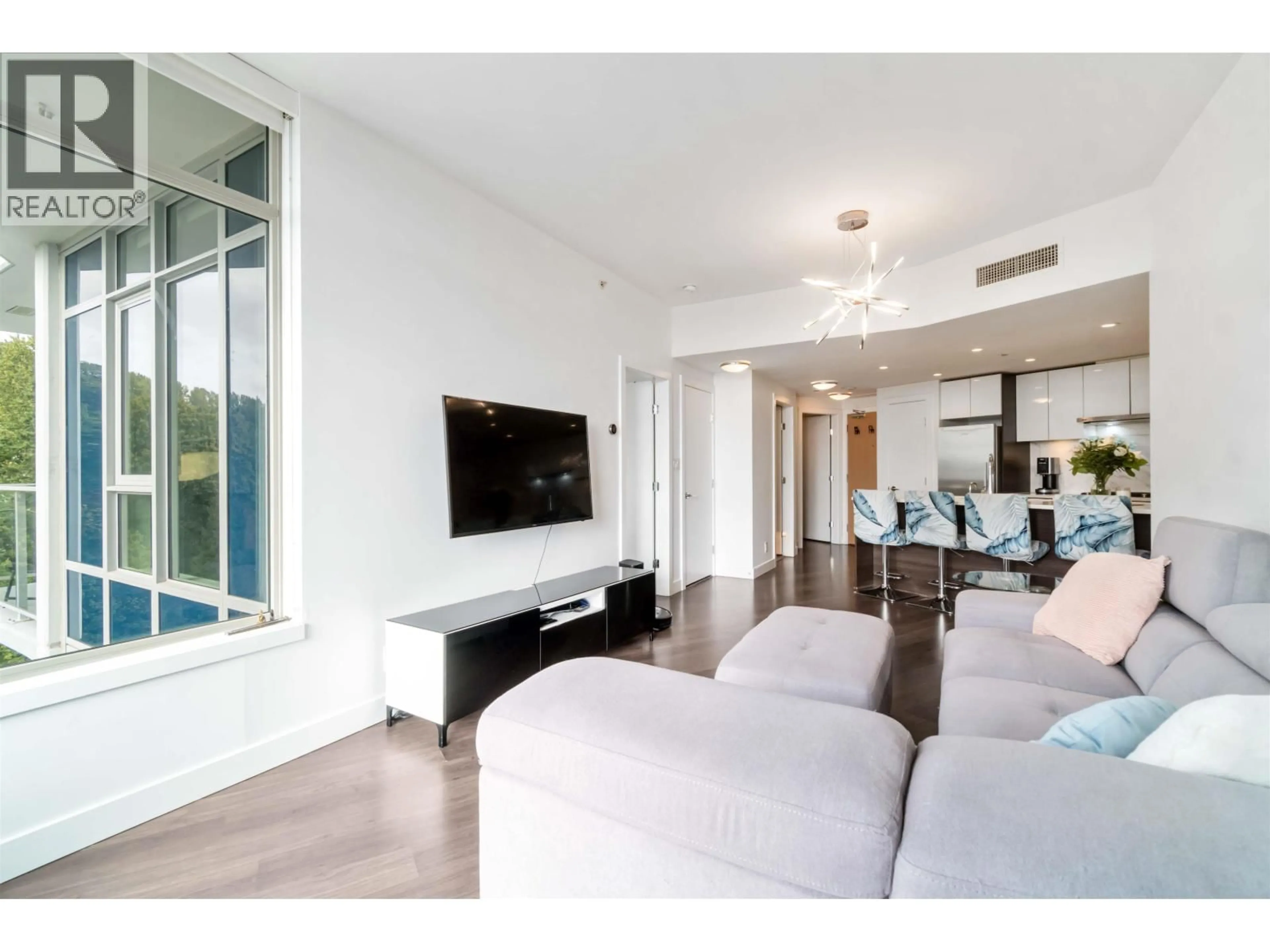 Living room with furniture, unknown for 1006 - 3557 SAWMILL CRESCENT, Vancouver British Columbia V5S0E2