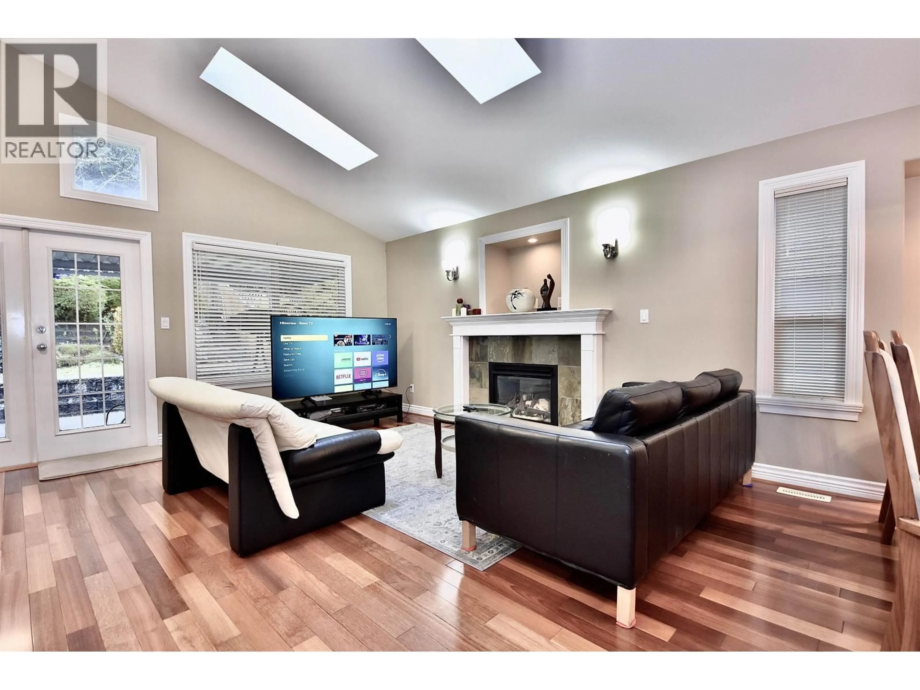 Living room with furniture, wood/laminate floor for 3035 MAPLEWOOD COURT, Coquitlam British Columbia V3E3P3
