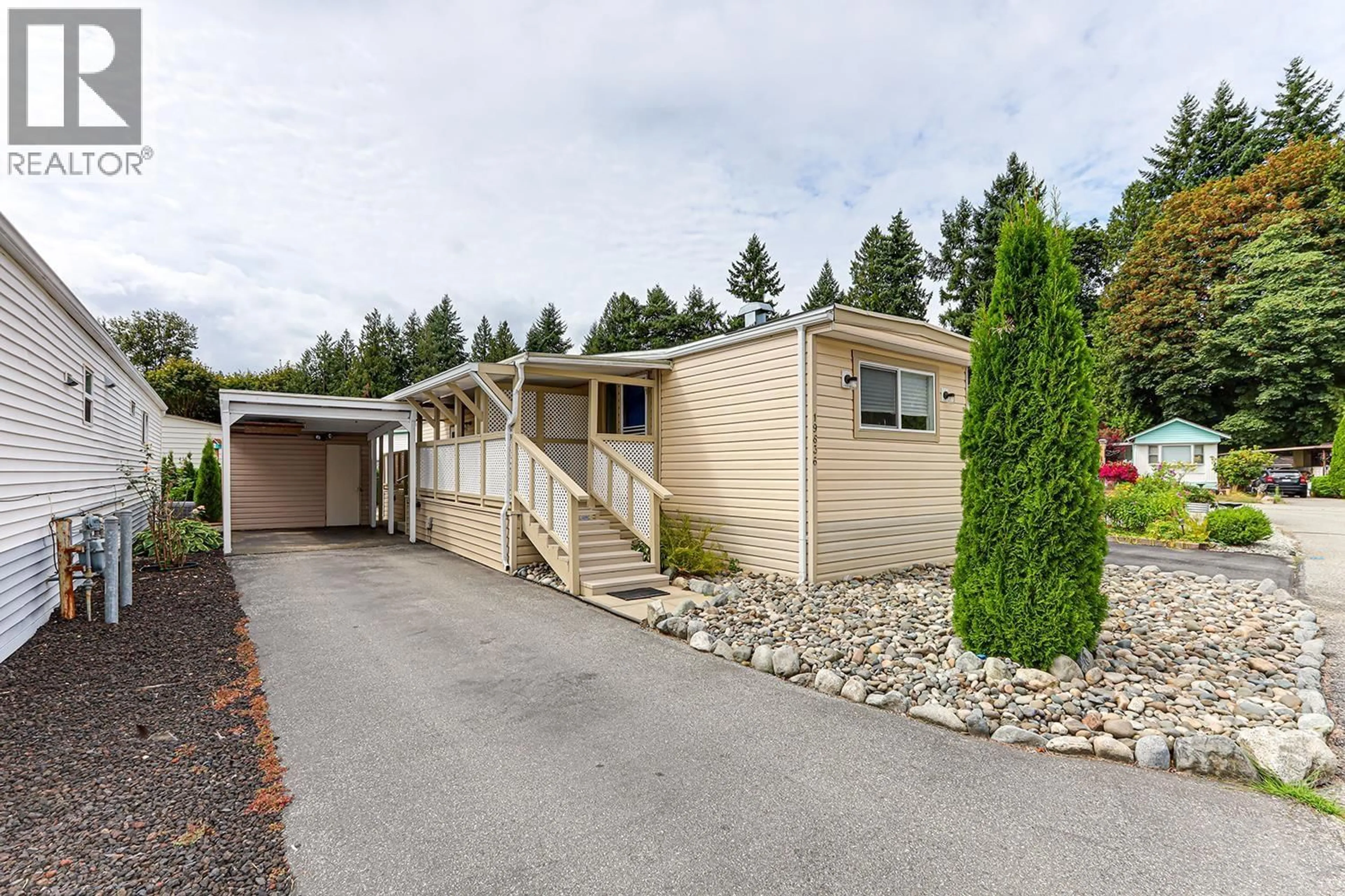 Home with vinyl exterior material, street for 19636 PINETREE LANE, Pitt Meadows British Columbia V3Y1Z3