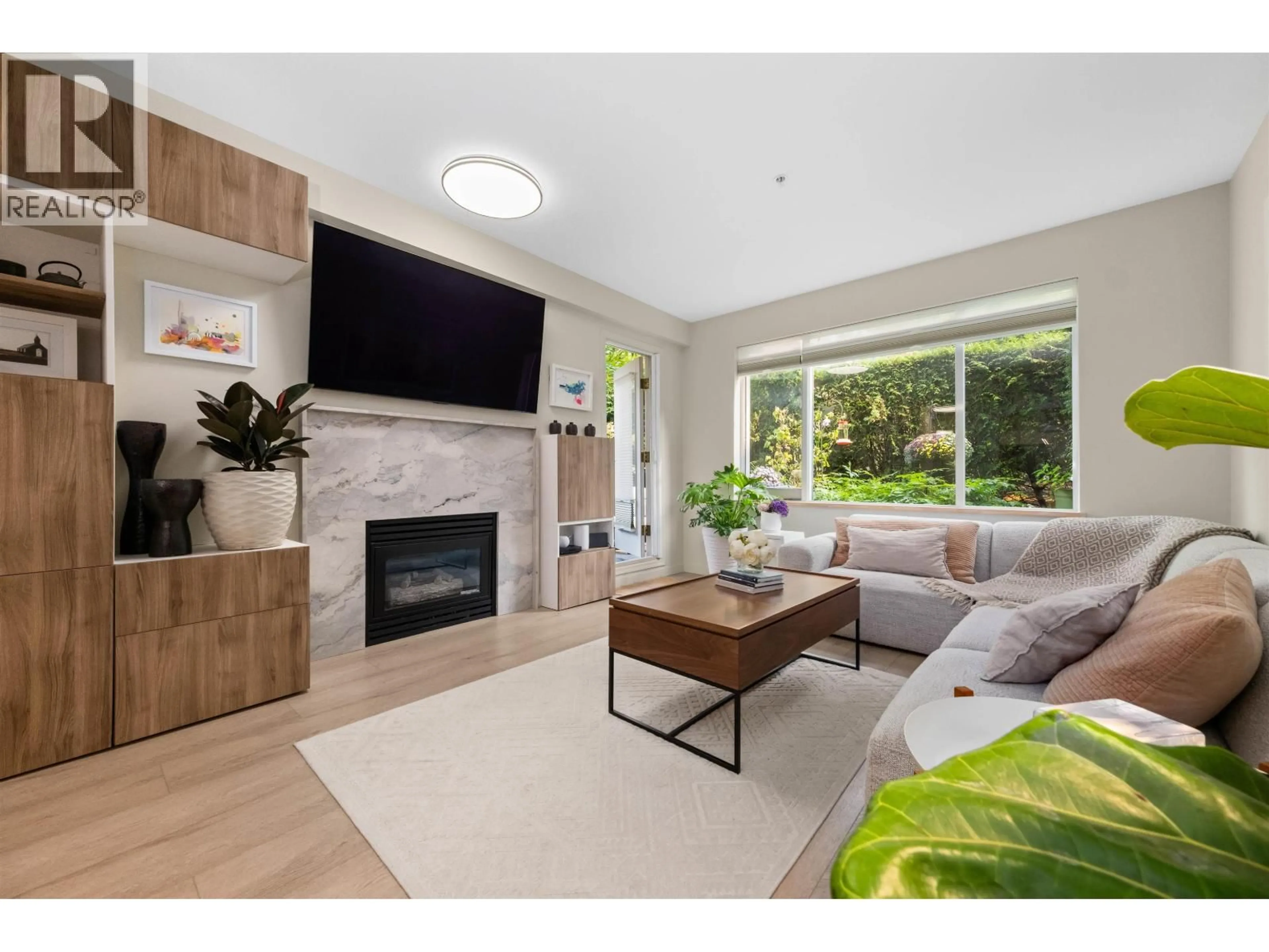Living room with furniture, unknown for 210 - 3608 DEERCREST DRIVE, North Vancouver British Columbia V7G2S8