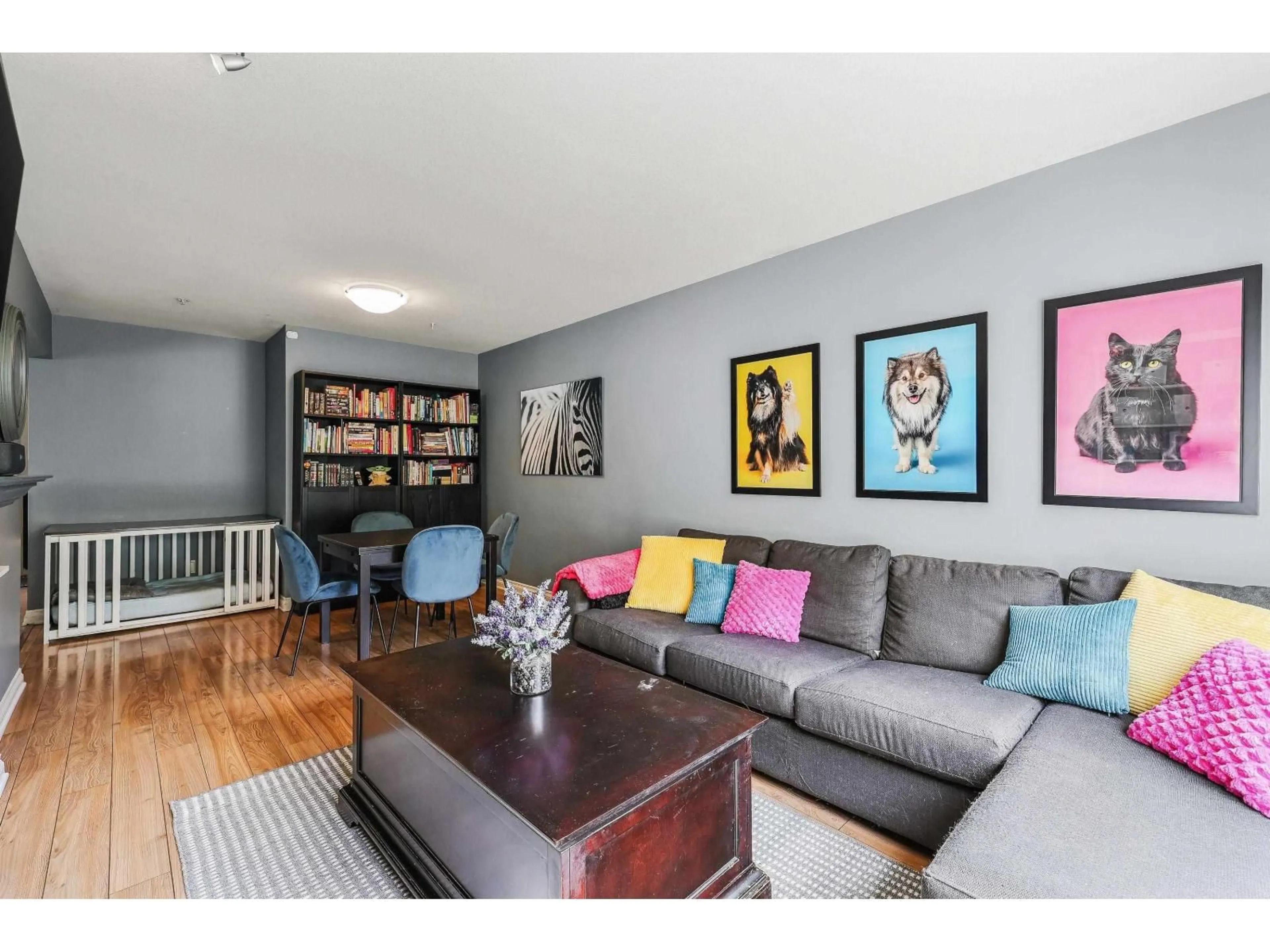 Living room with furniture, wood/laminate floor for 23 - 6513 200, Surrey British Columbia V2Y2V7