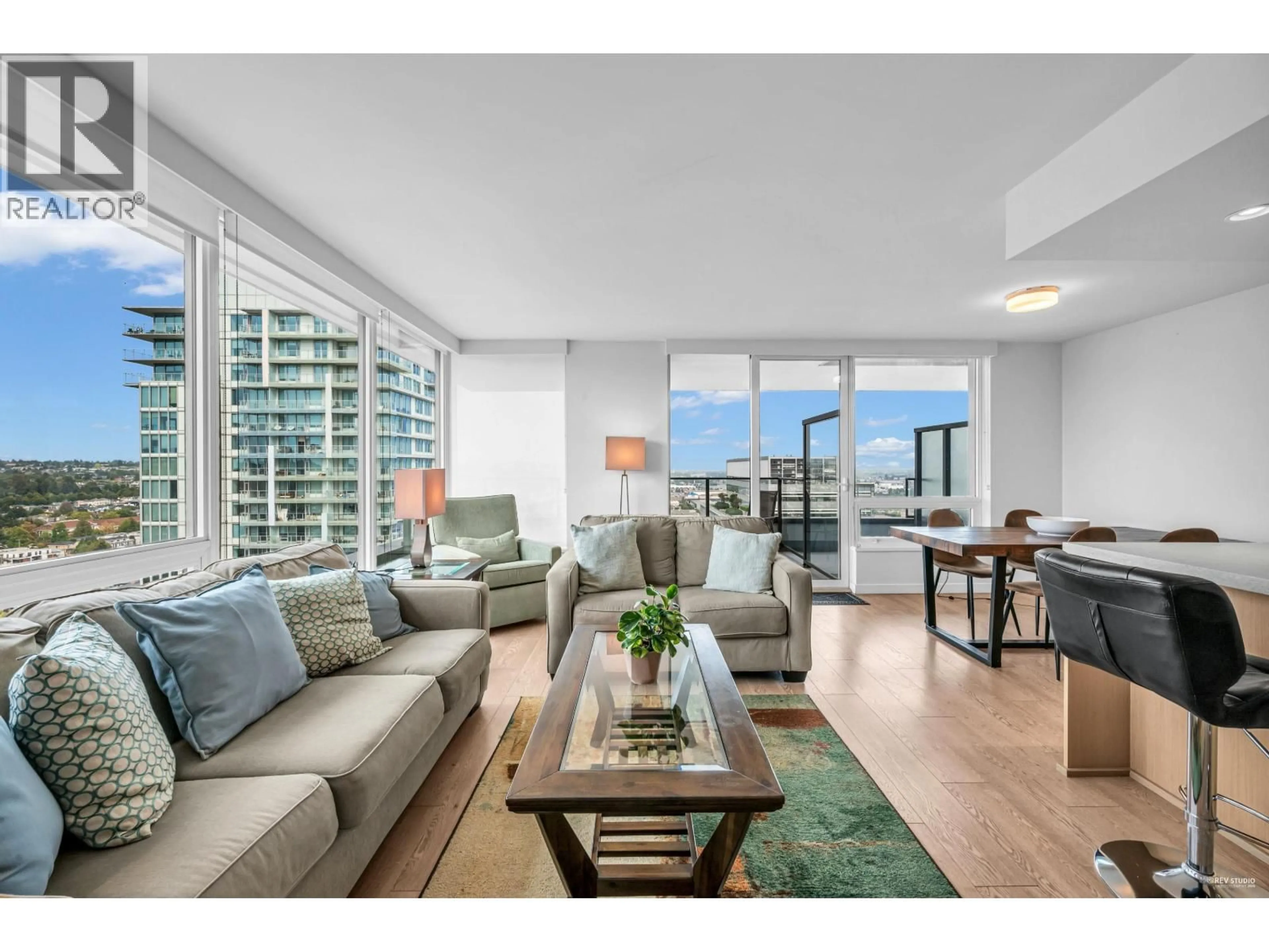 Living room with furniture, wood/laminate floor for 2504 - 8189 CAMBIE STREET, Vancouver British Columbia V6P0G6