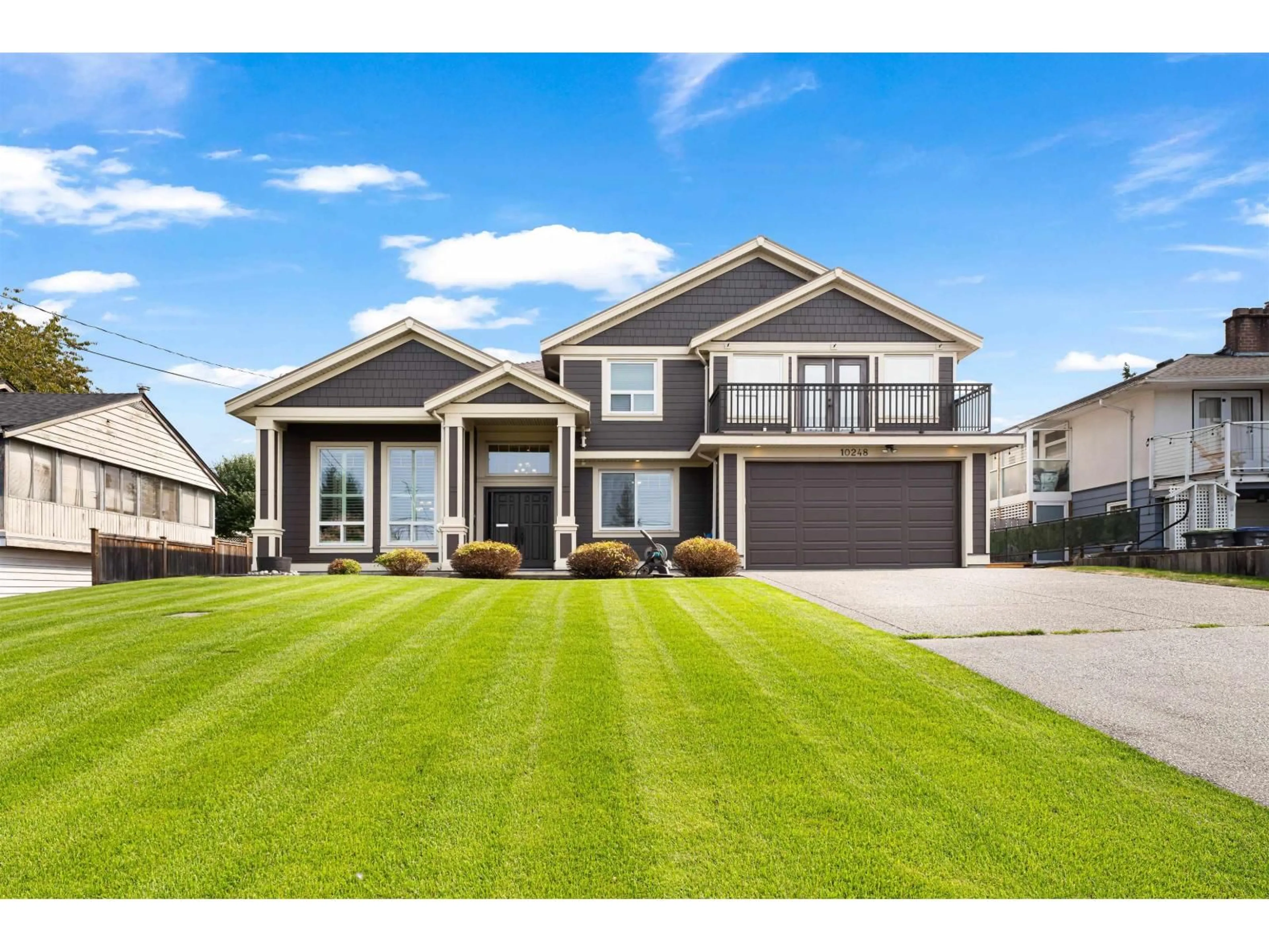 Home with vinyl exterior material, street for 10248 124A, Surrey British Columbia V3V4W6