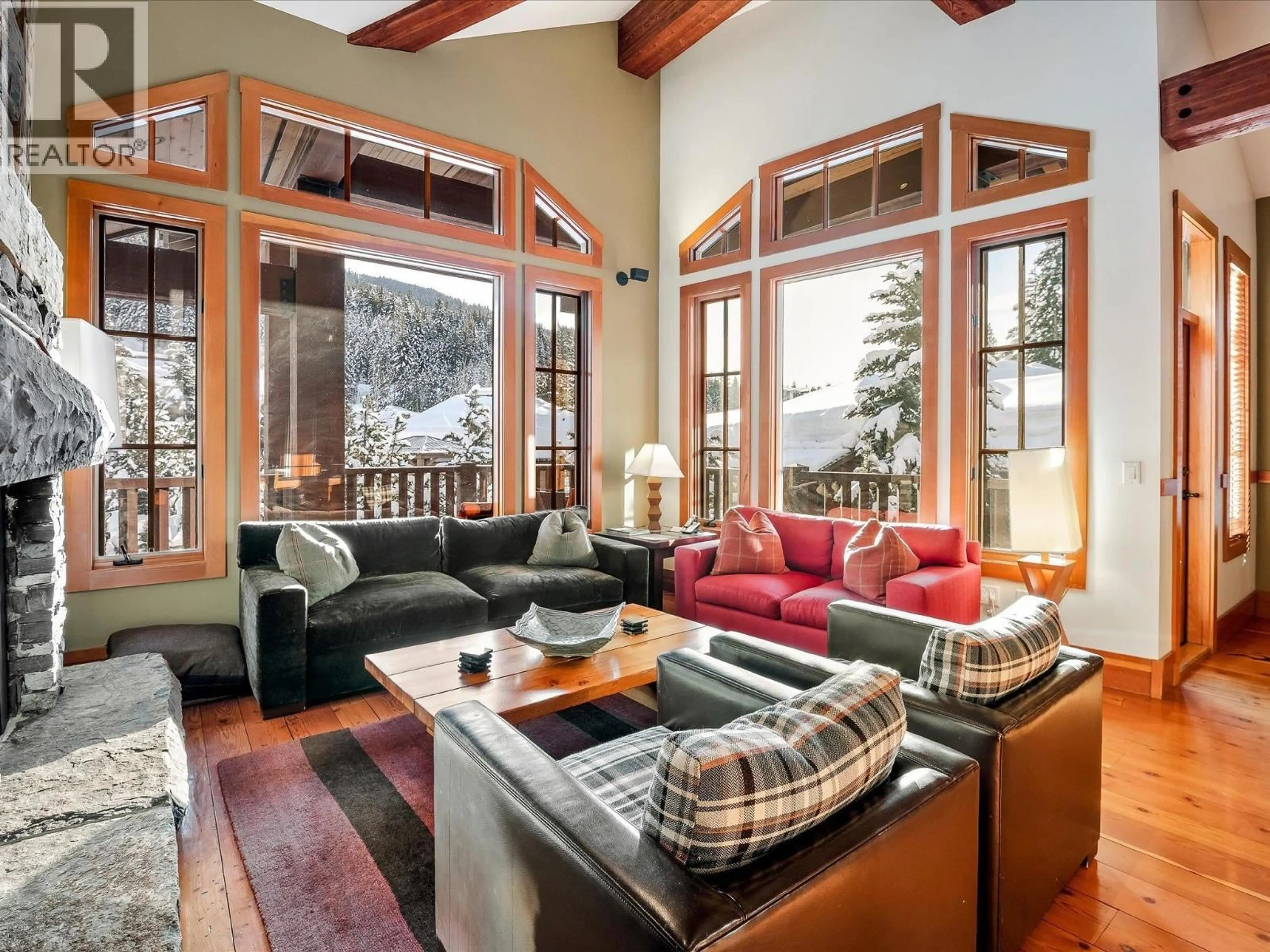 Living room with furniture, wood/laminate floor for 1B - 2300 NORDIC DRIVE, Whistler British Columbia V8E0A6