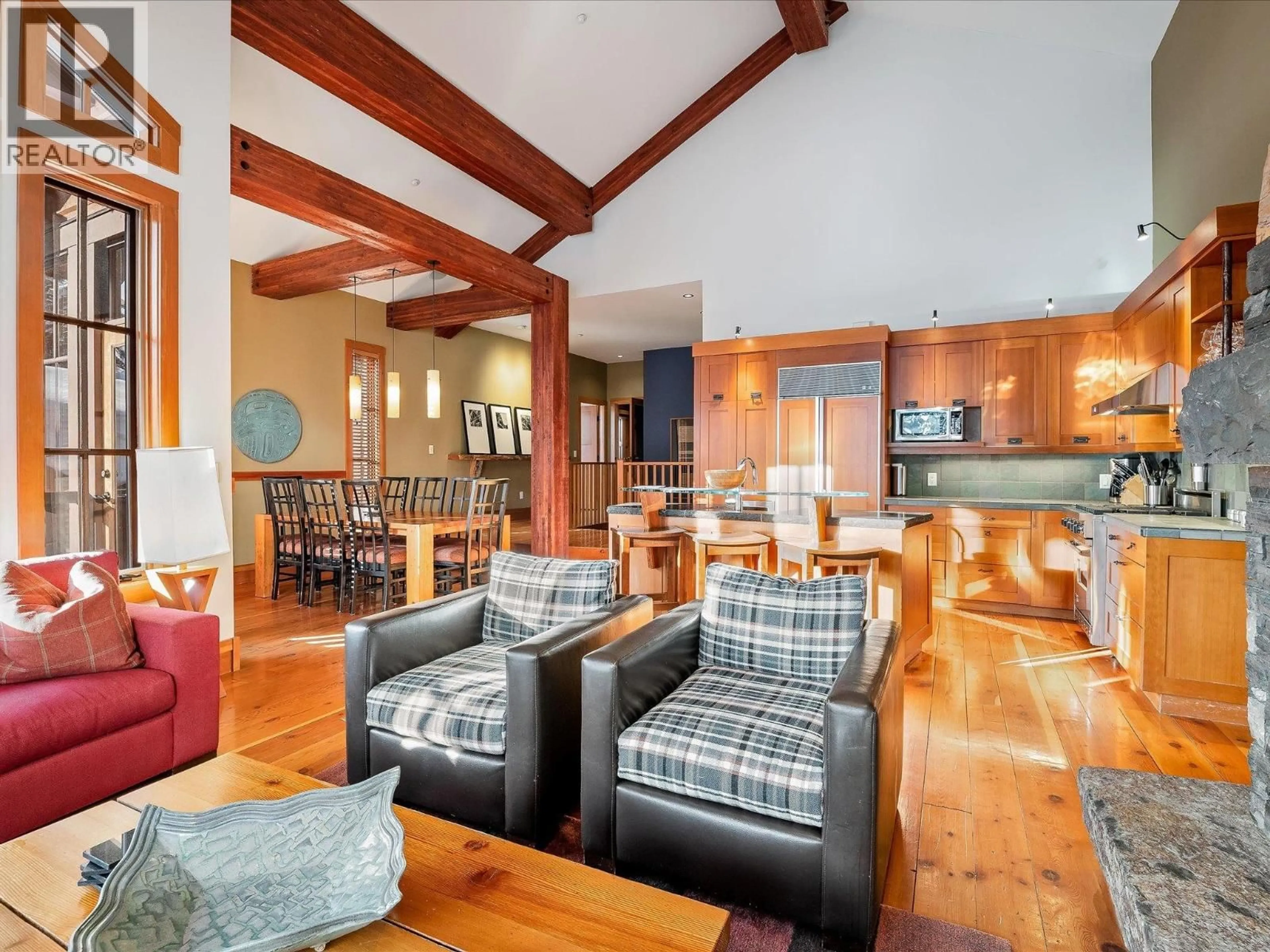 Open concept kitchen, wood/laminate floor for 1B - 2300 NORDIC DRIVE, Whistler British Columbia V8E0A6